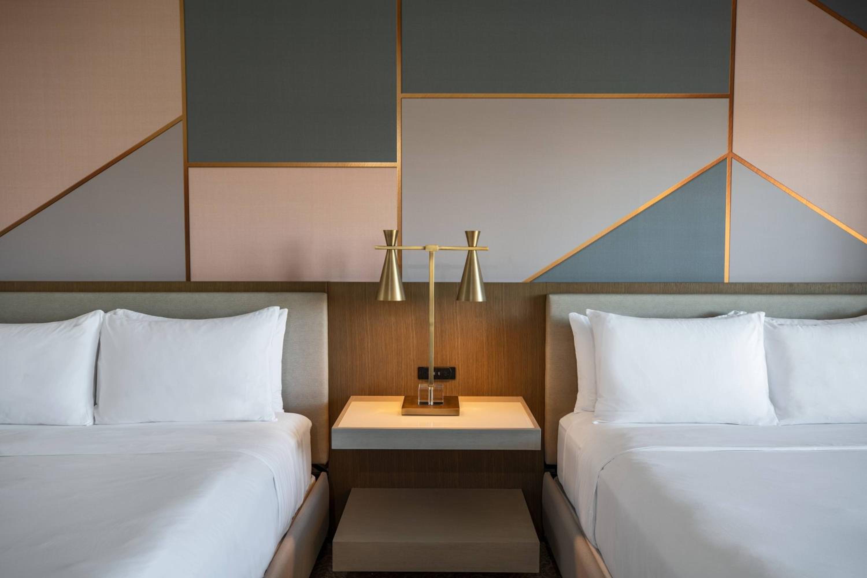 Queen Room with Two Queen Beds with Resort View - Photo 1
