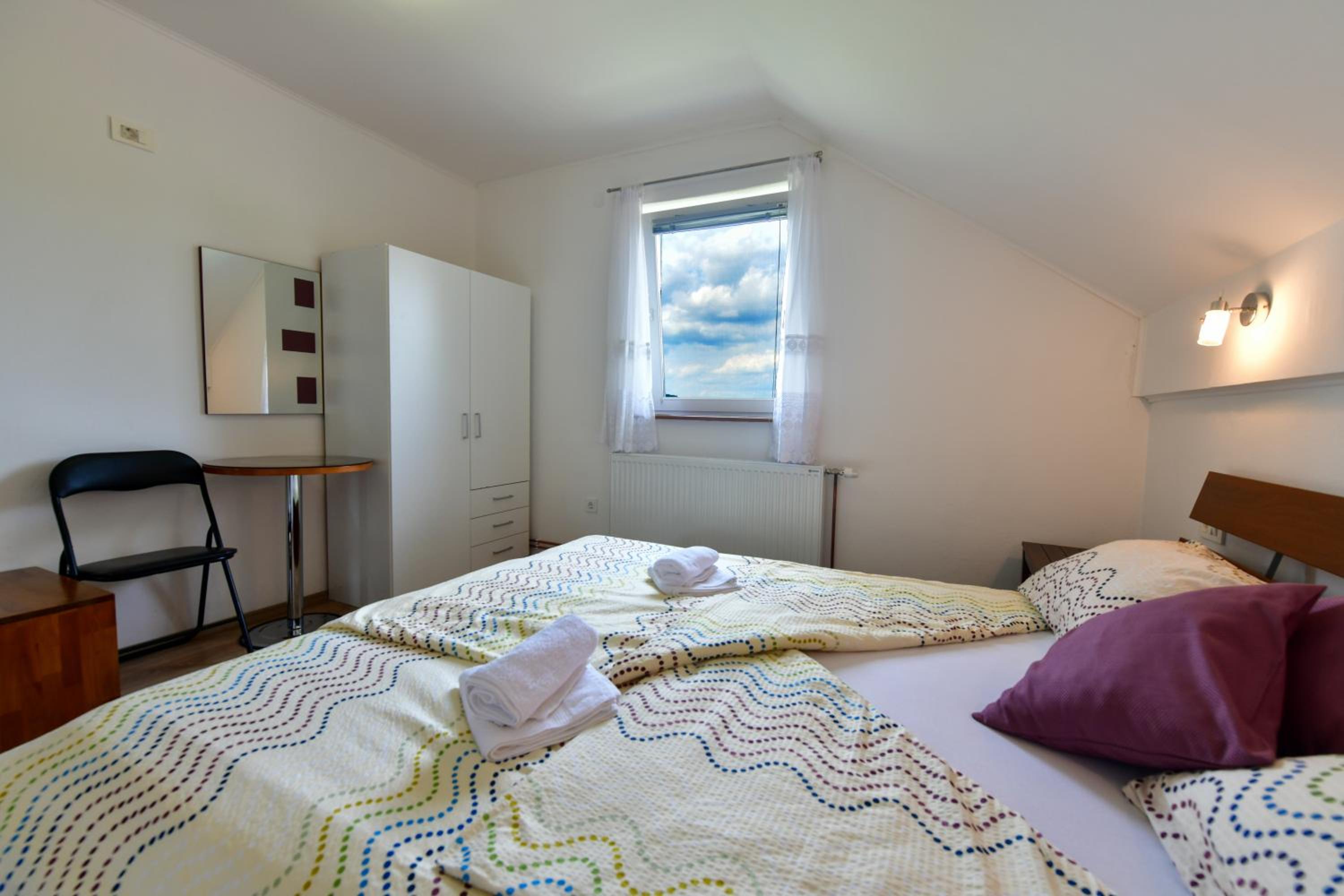 Two-Bedroom Apartment - Photo 13