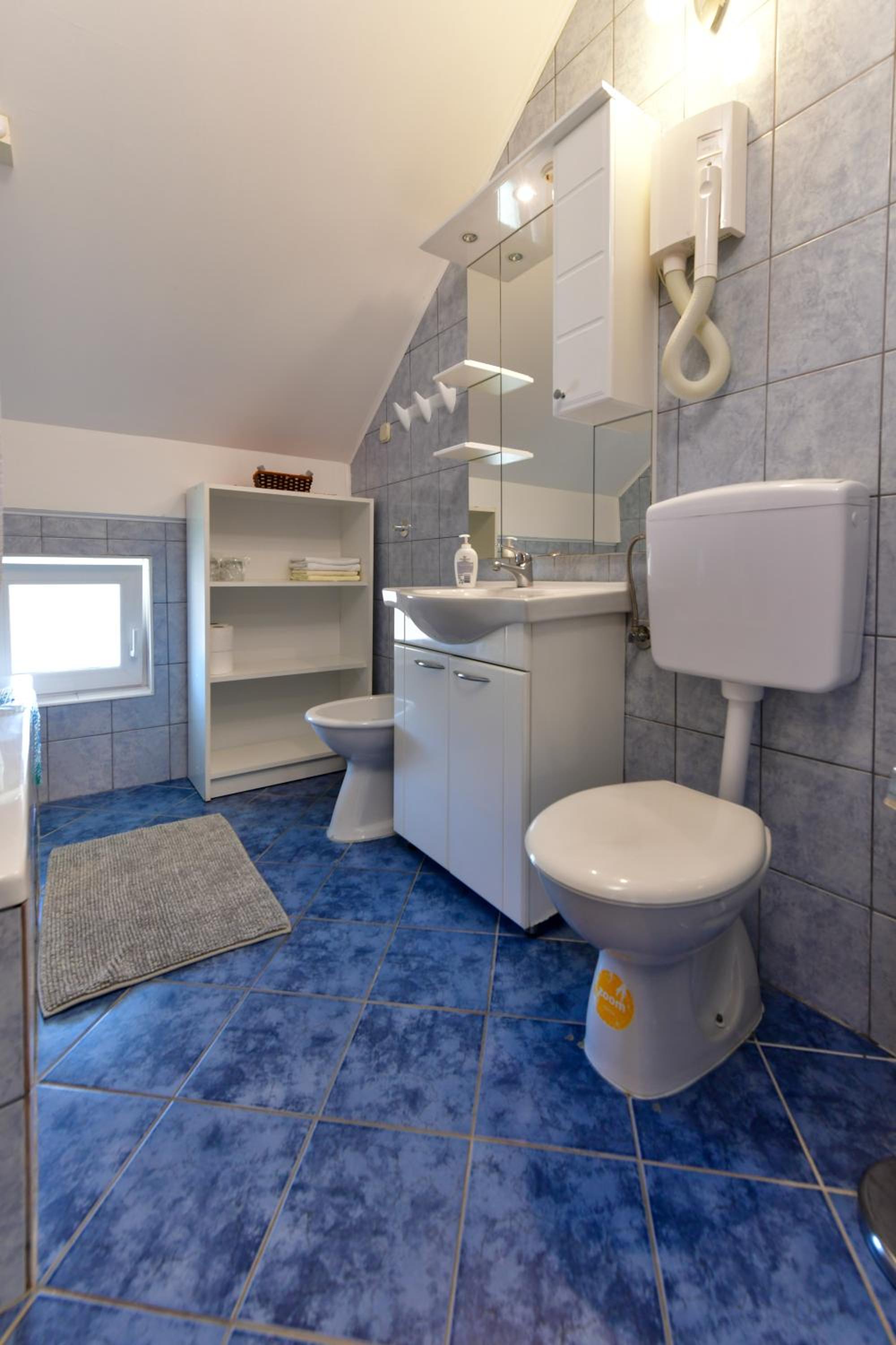 Two-Bedroom Apartment - Photo 43