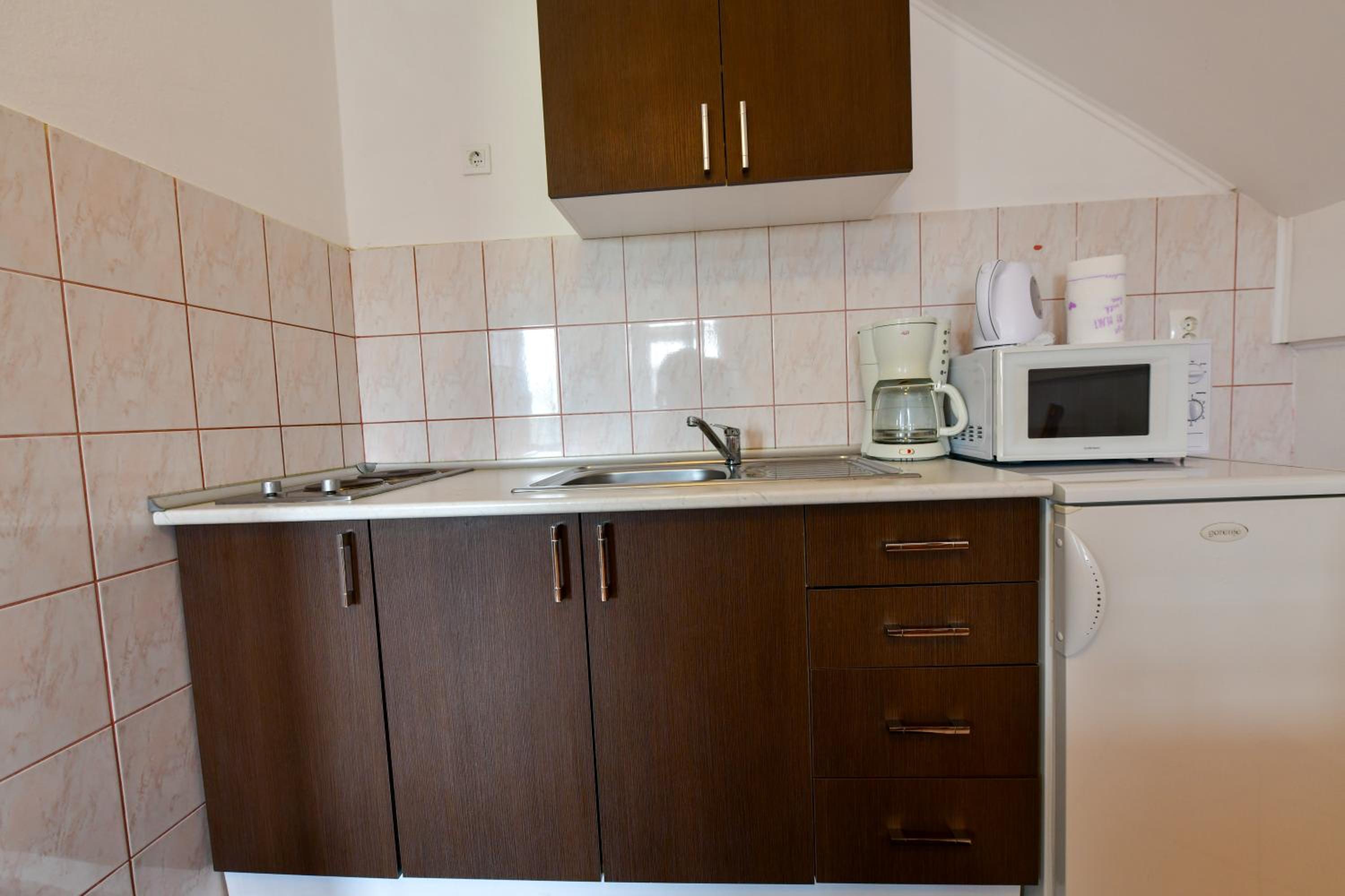 Two-Bedroom Apartment - Photo 32