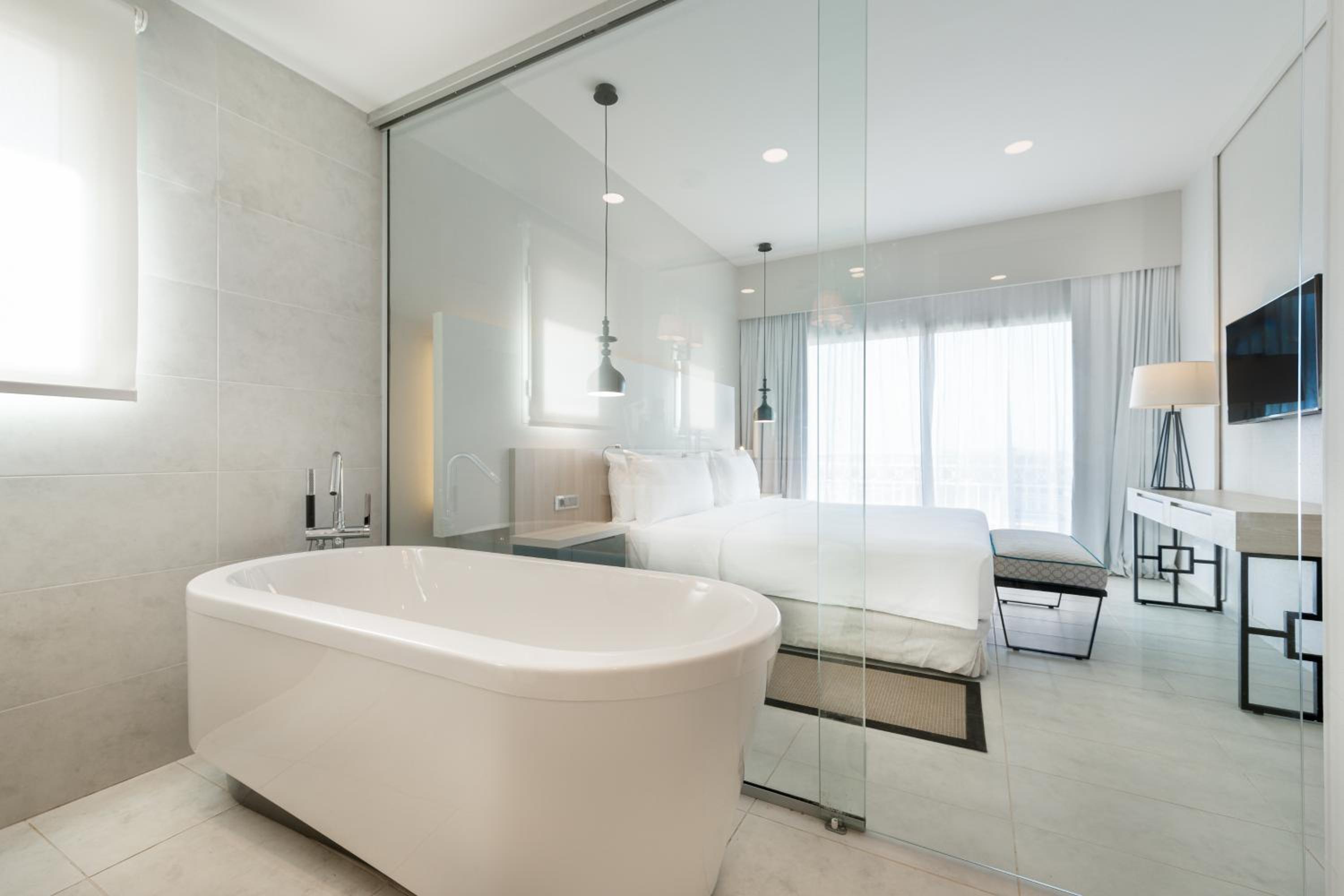 One-Bedroom Suite with Balcony and Partial Sea View