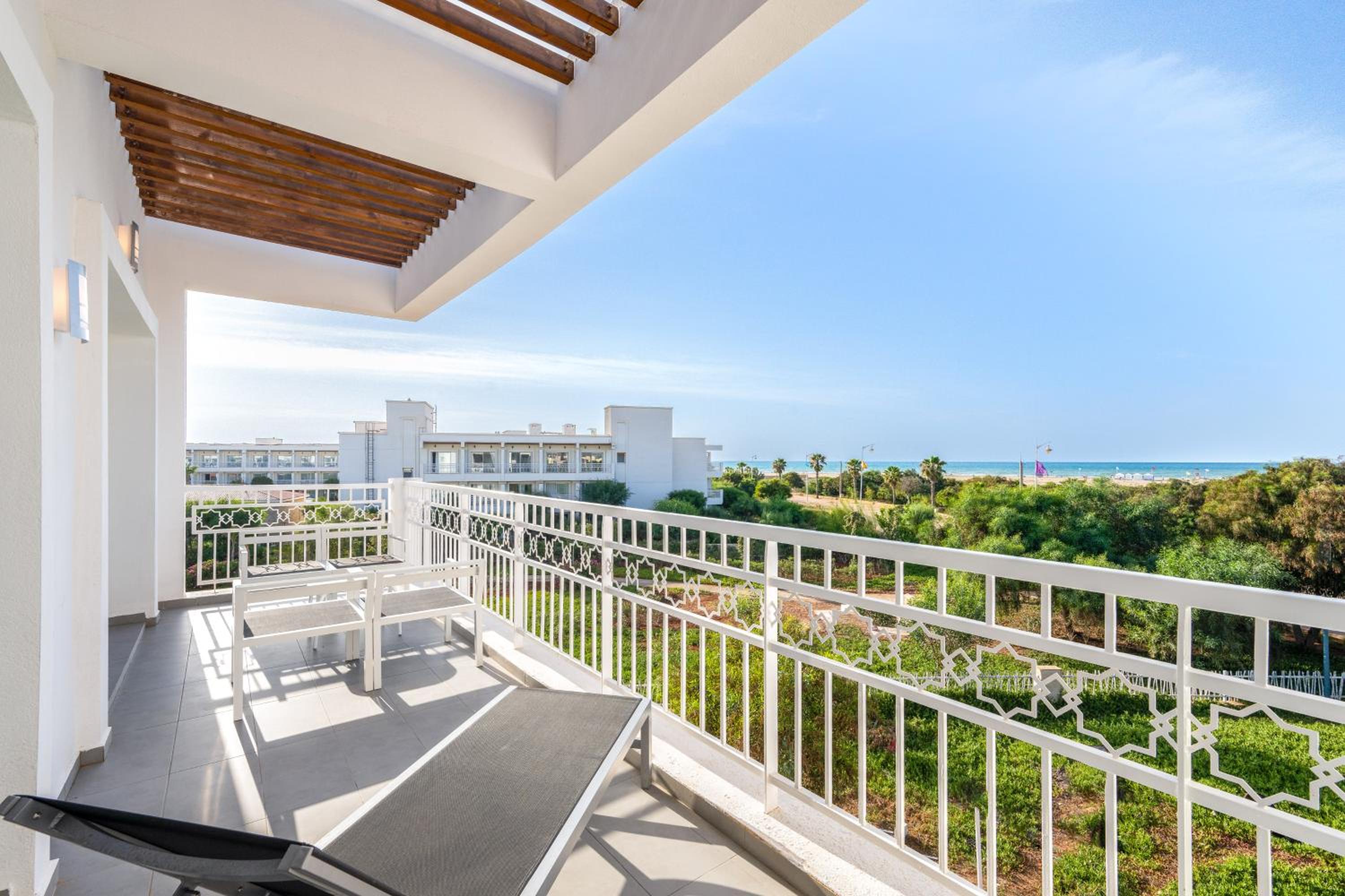 One-Bedroom Suite with Balcony and Sea View