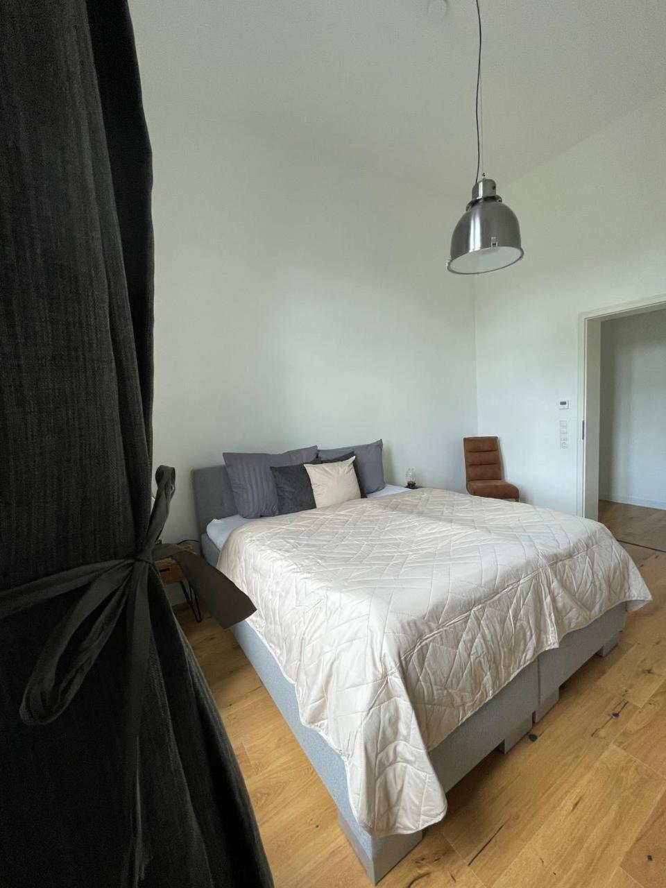 Three-Bedroom Apartment - Photo 32