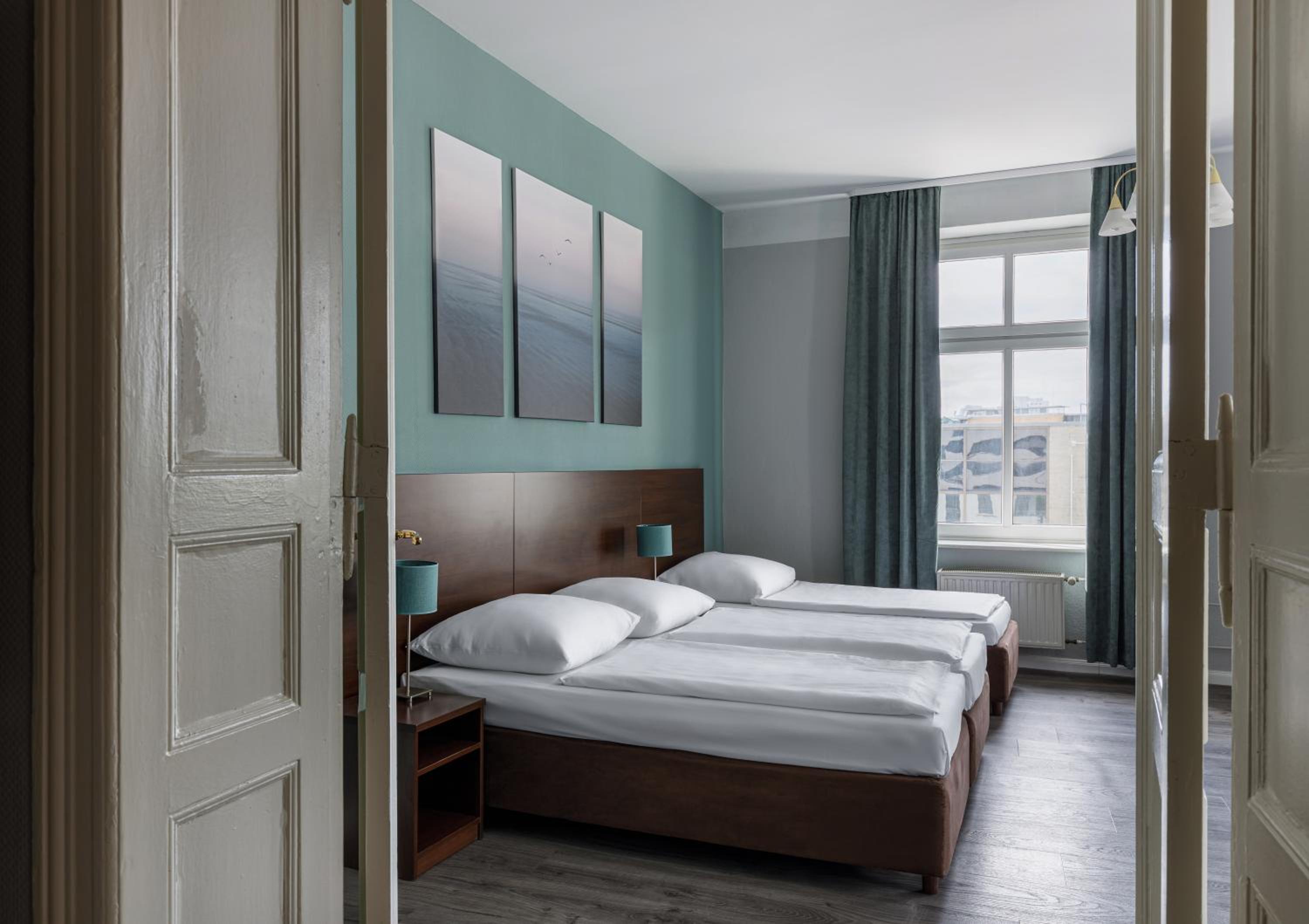 Double Room for 4 guests with Extra Bed photo 1