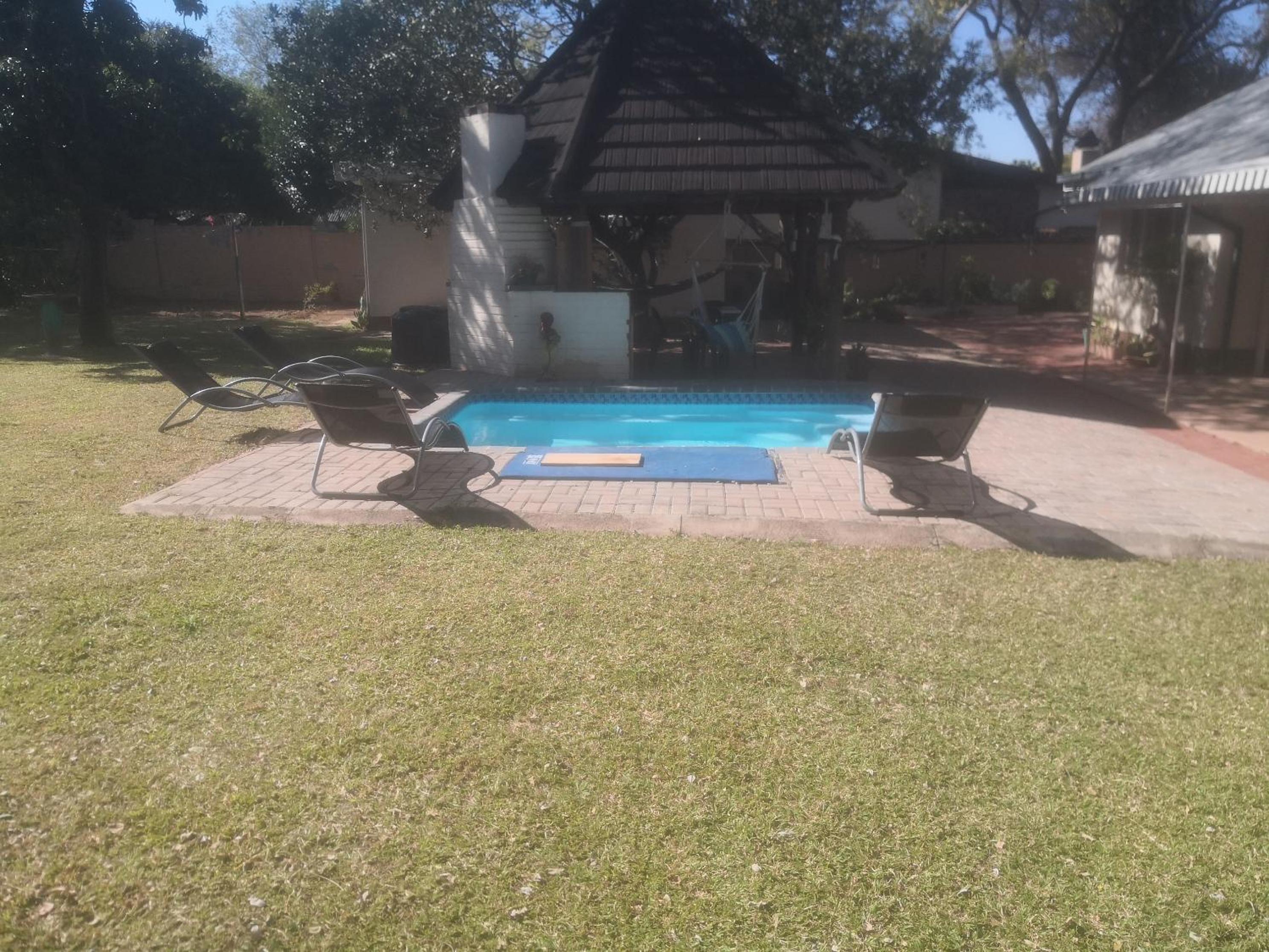 Three-Bedroom House - Photo 34