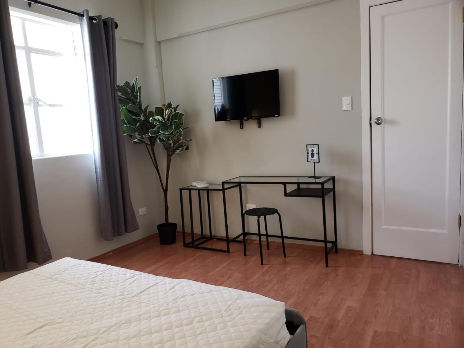 Queen Room with Shared Bathroom