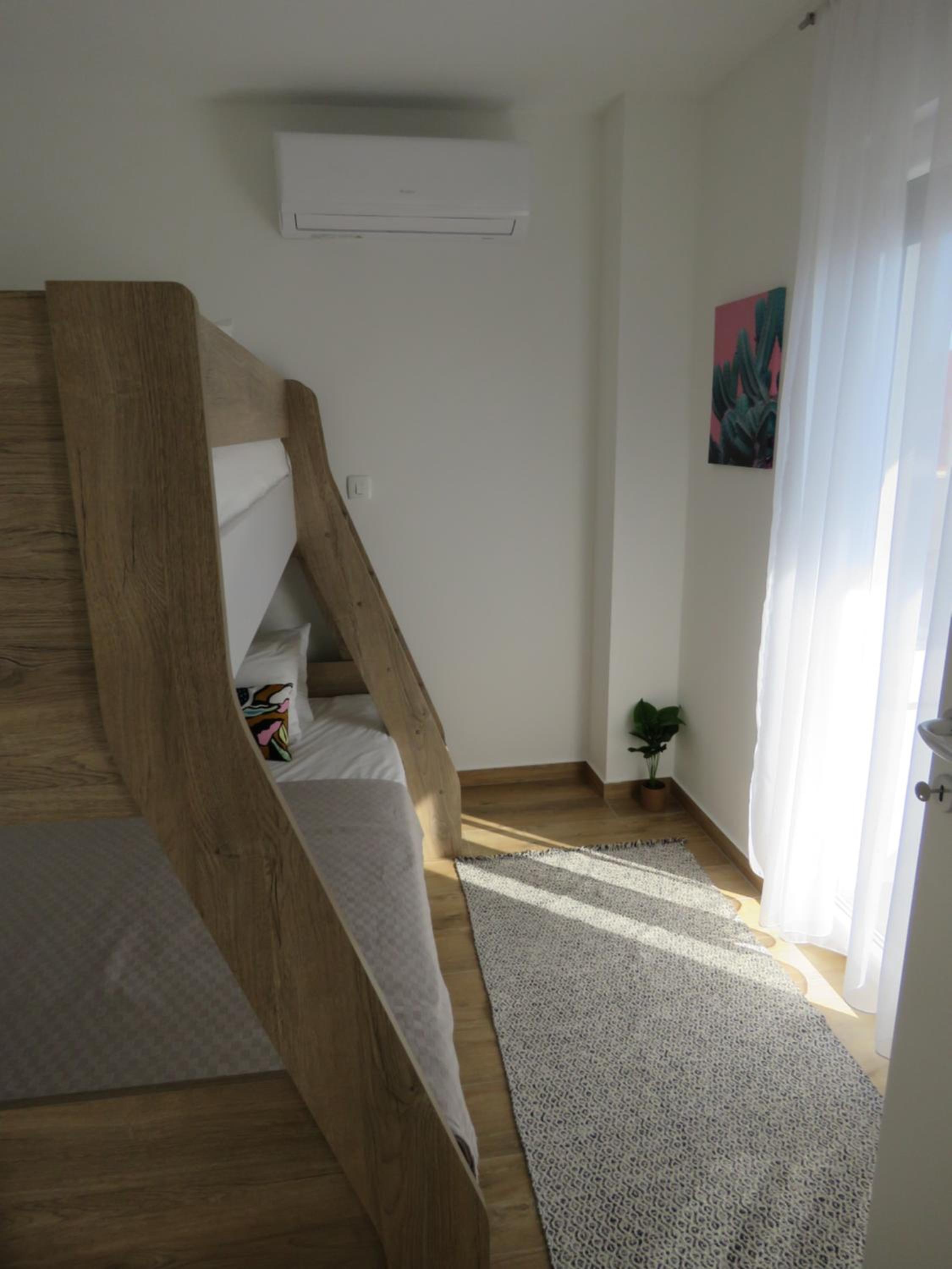 Three-Bedroom Apartment photo 1