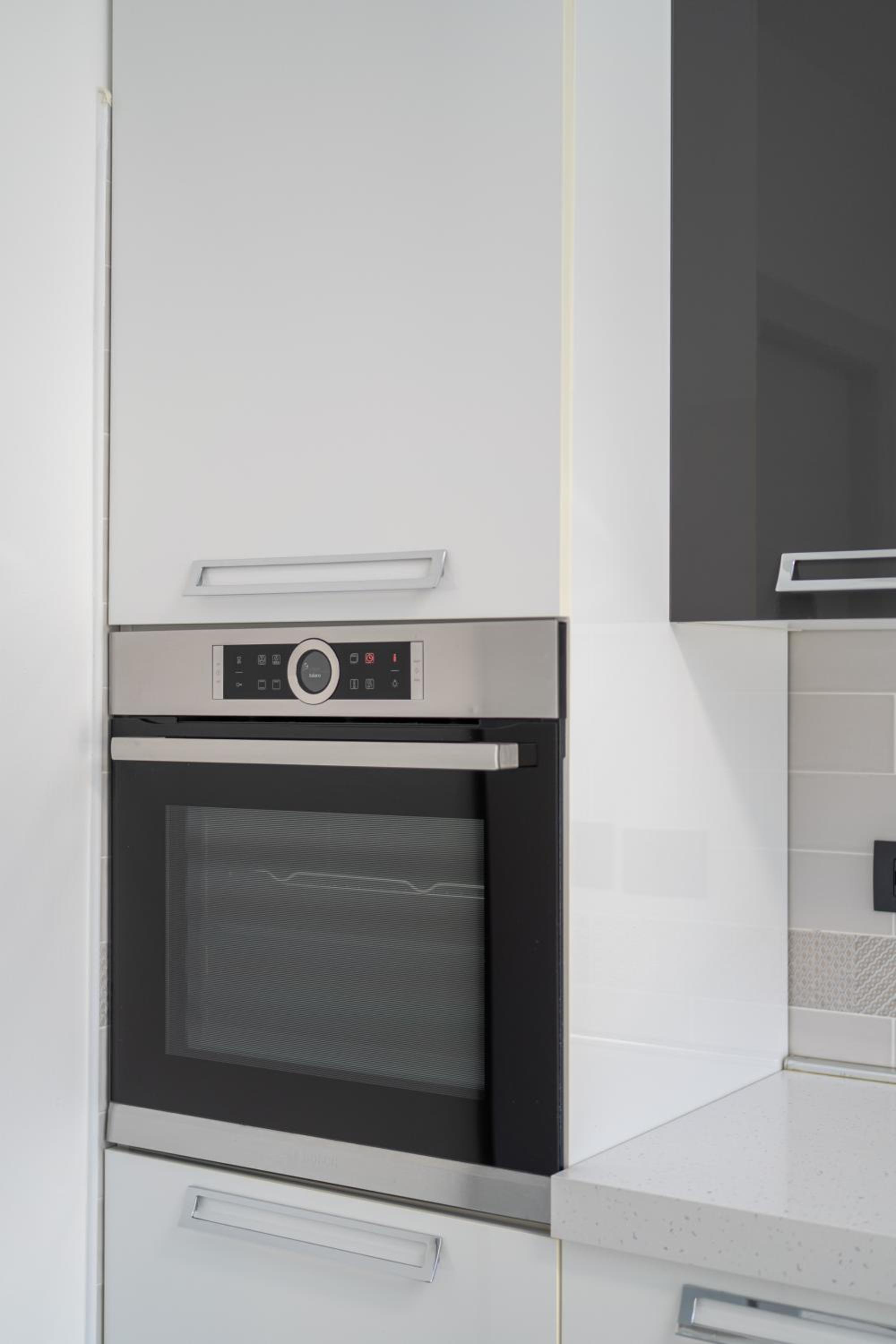 Three-Bedroom Apartment - Photo 36