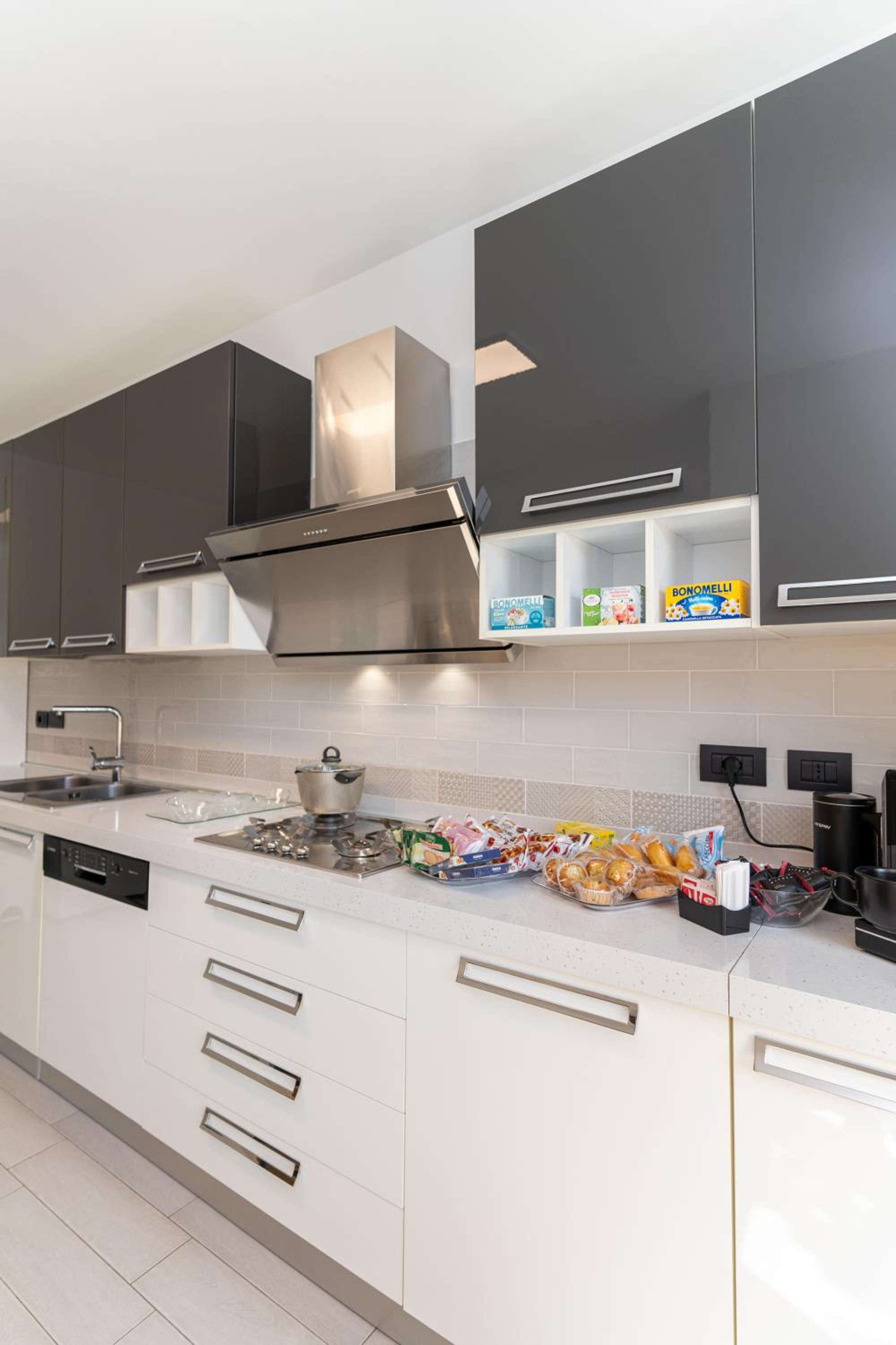 Three-Bedroom Apartment - Photo 32