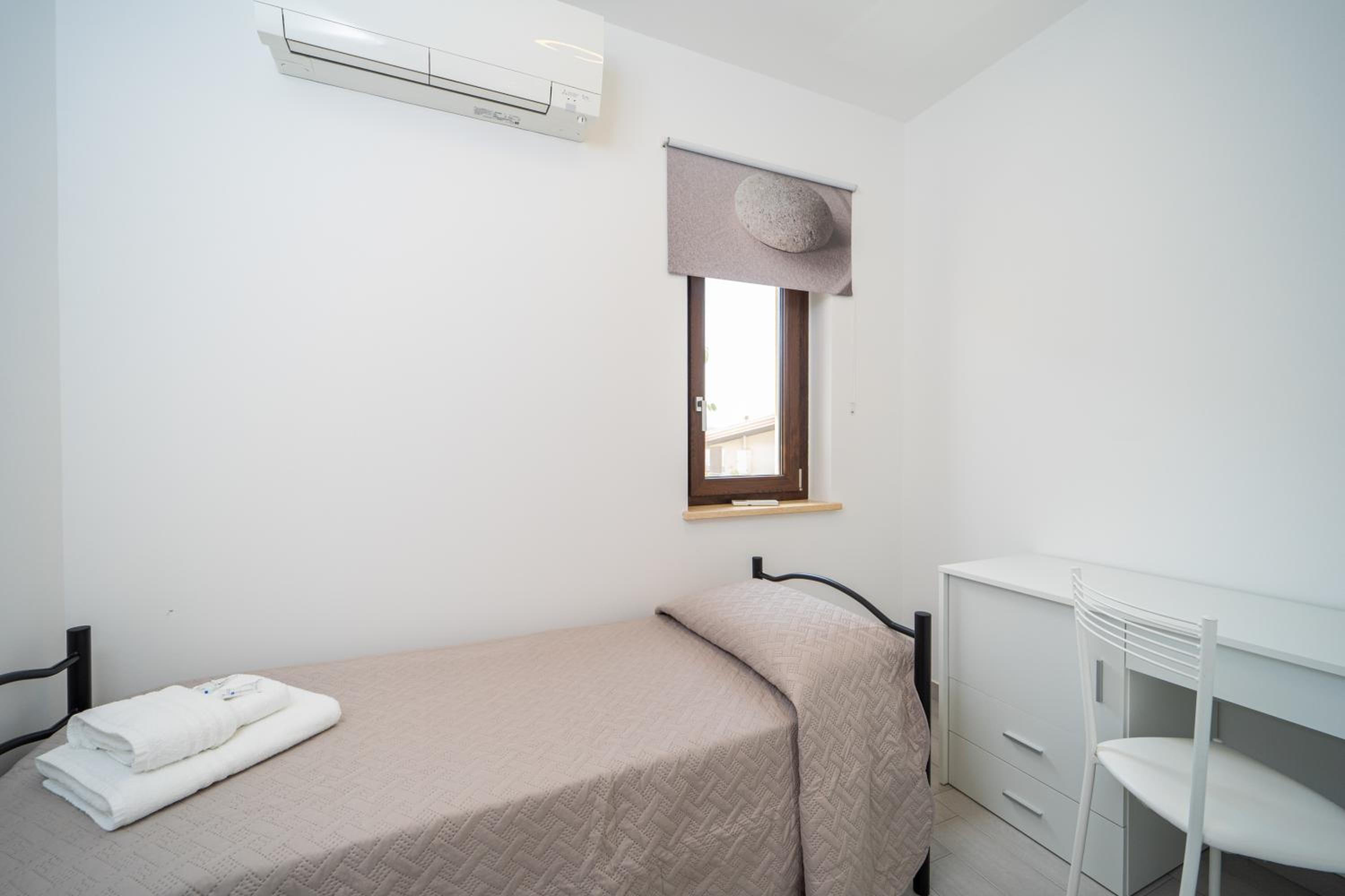 Three-Bedroom Apartment - Photo 10