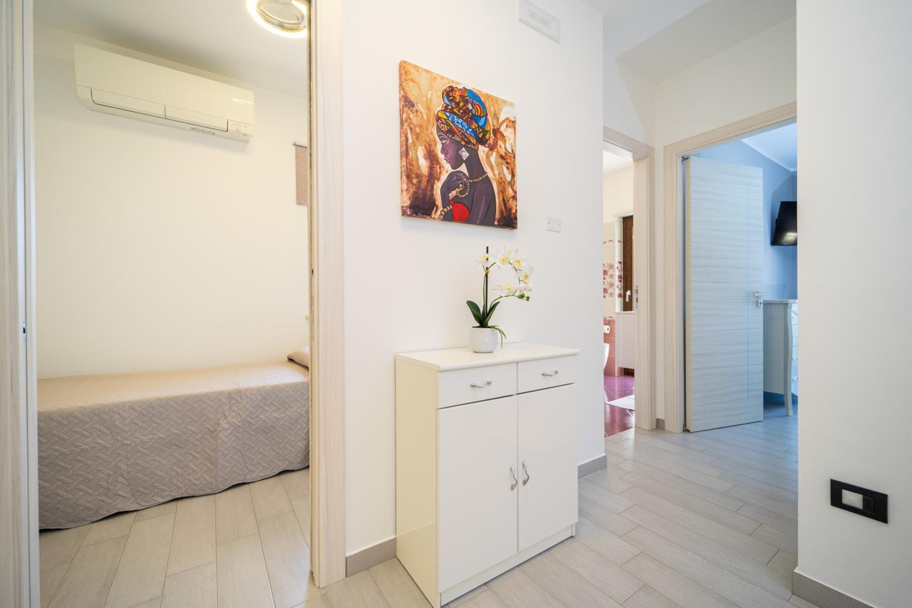 Three-Bedroom Apartment - Photo 18