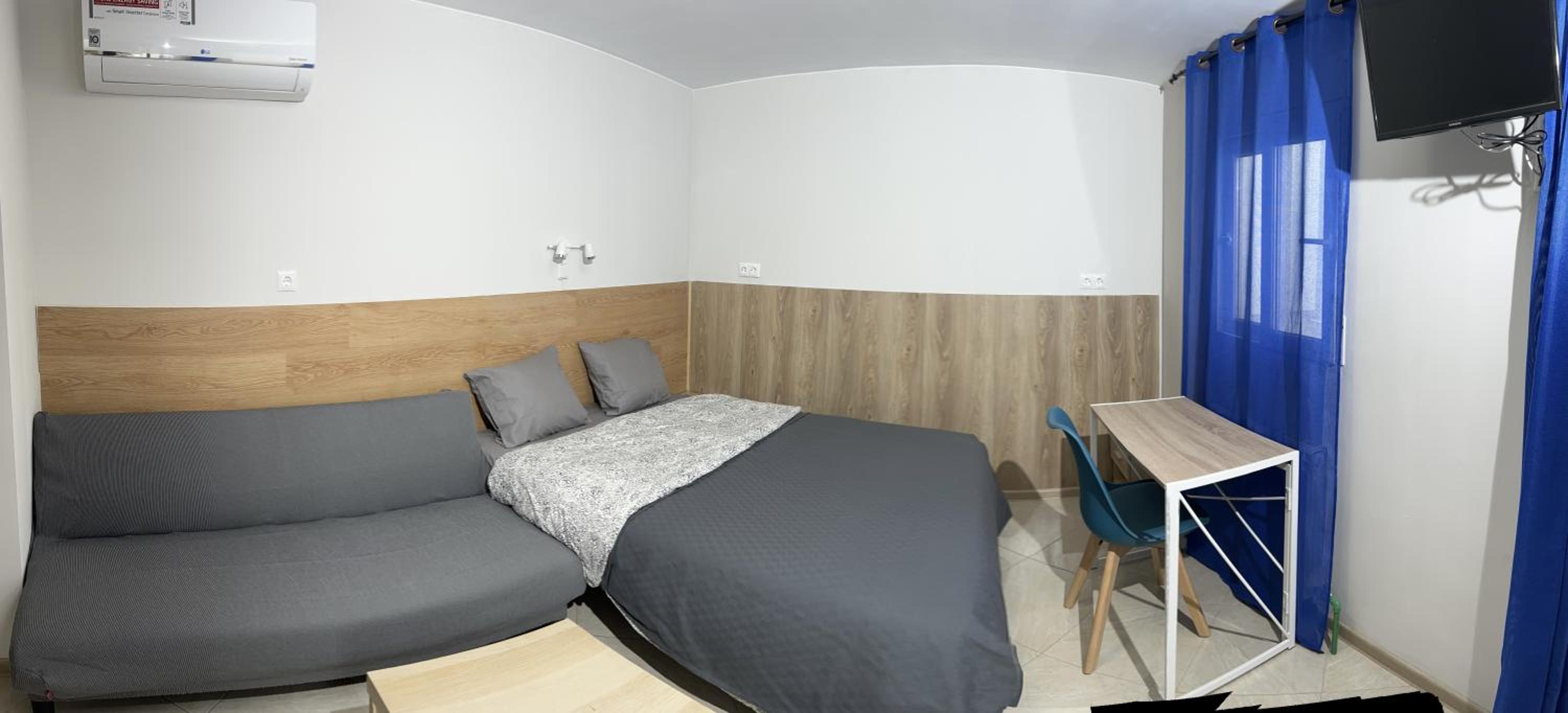 Estudio King con Sofá Cama