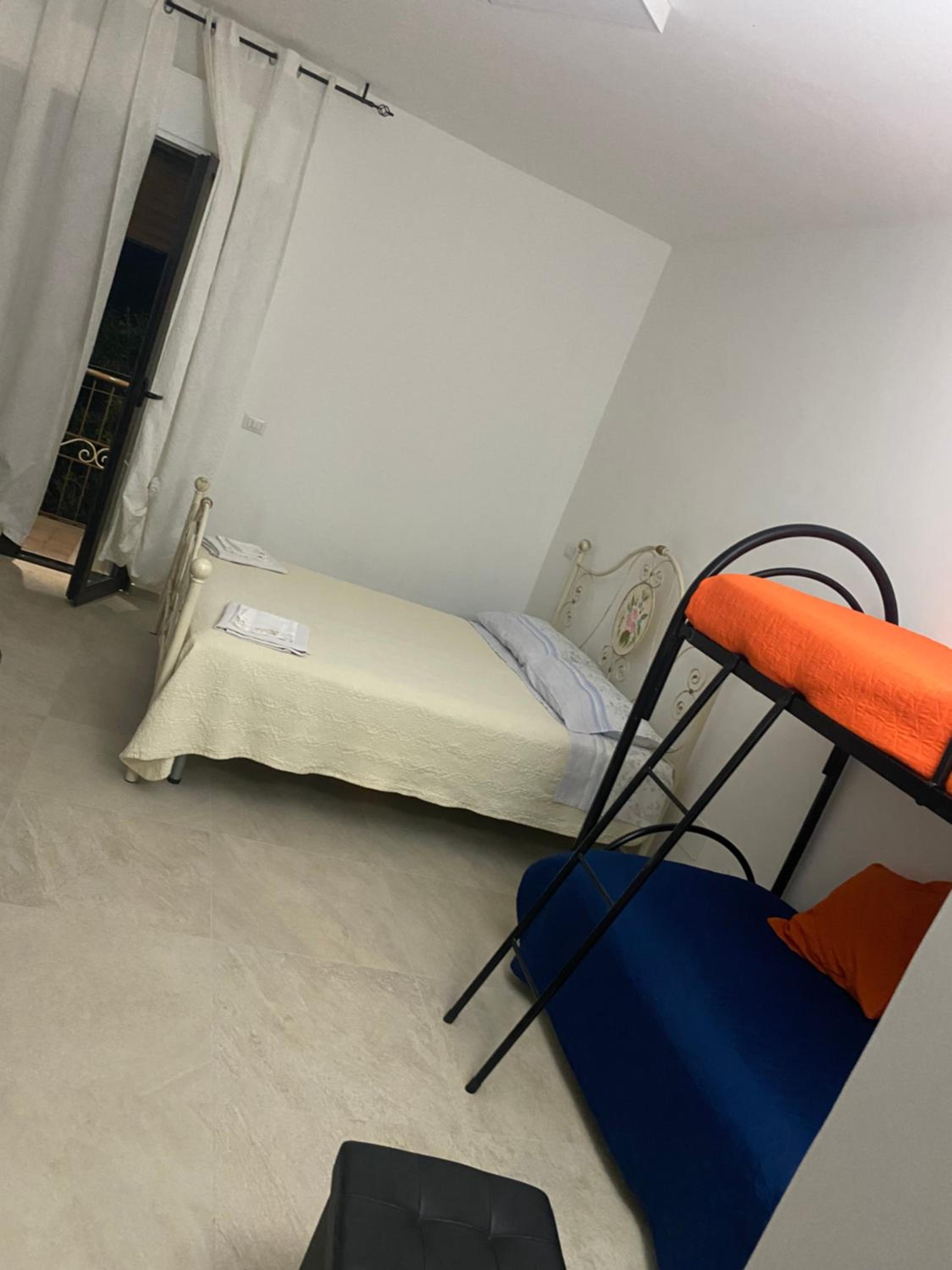 Quadruple Room with Balcony photo 2