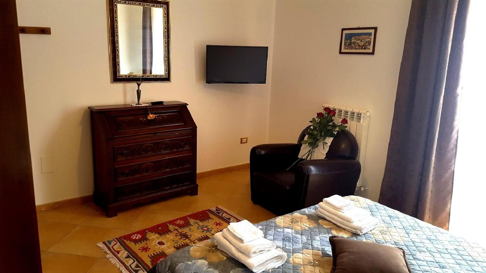 Superior Quadruple Room - Photo 14