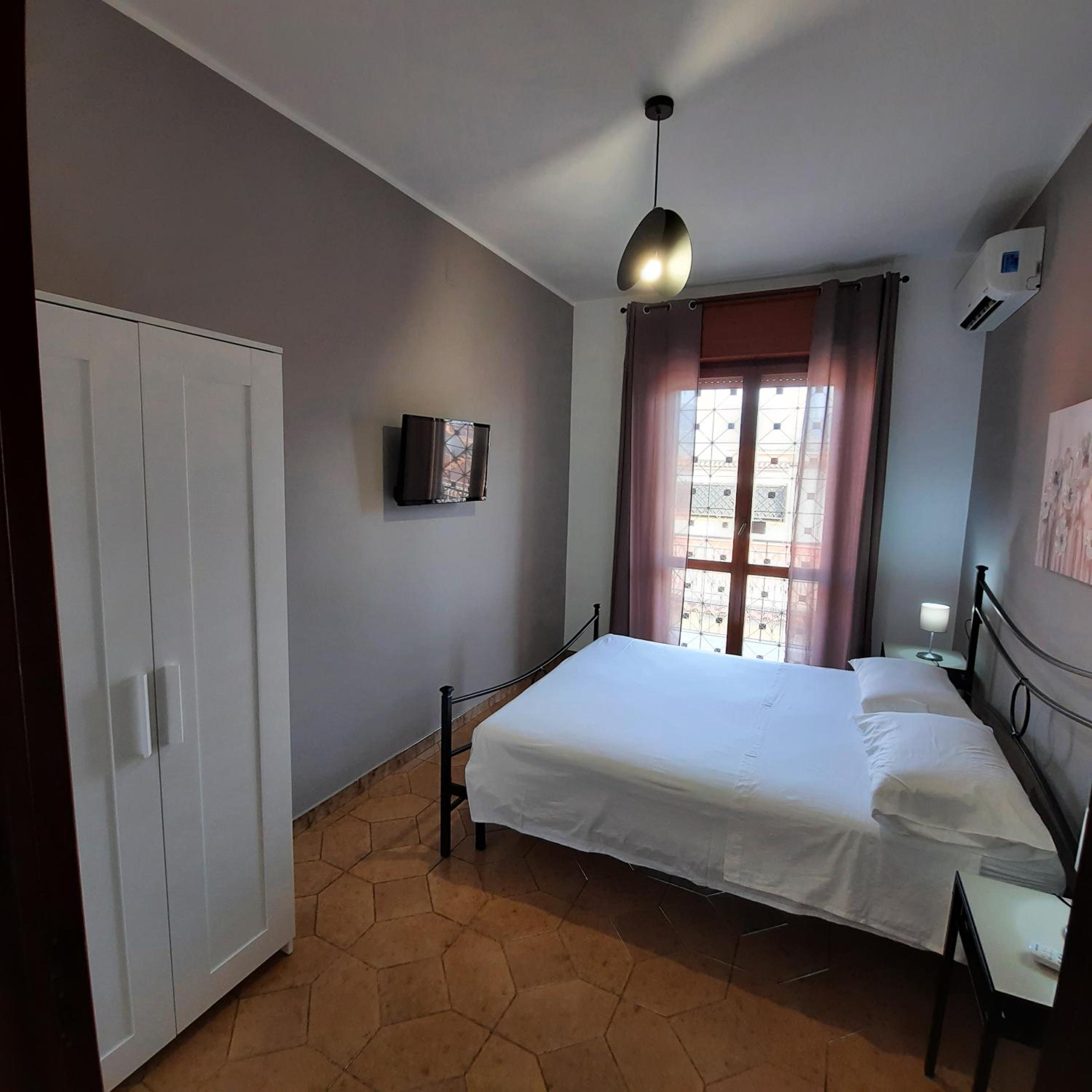 One-Bedroom Apartment with Balcony and City View