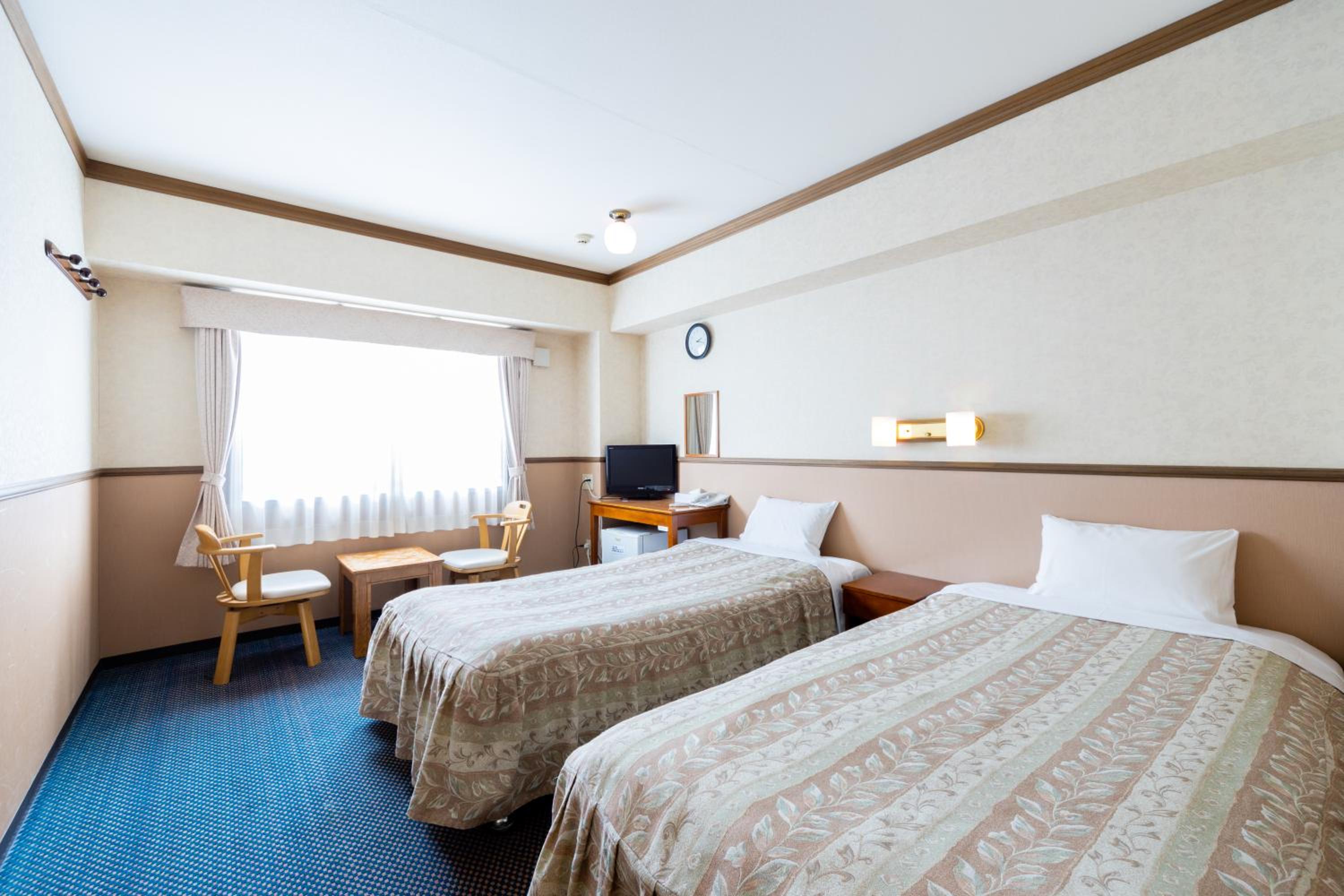 Twin Room - Non-Smoking - Photo 1