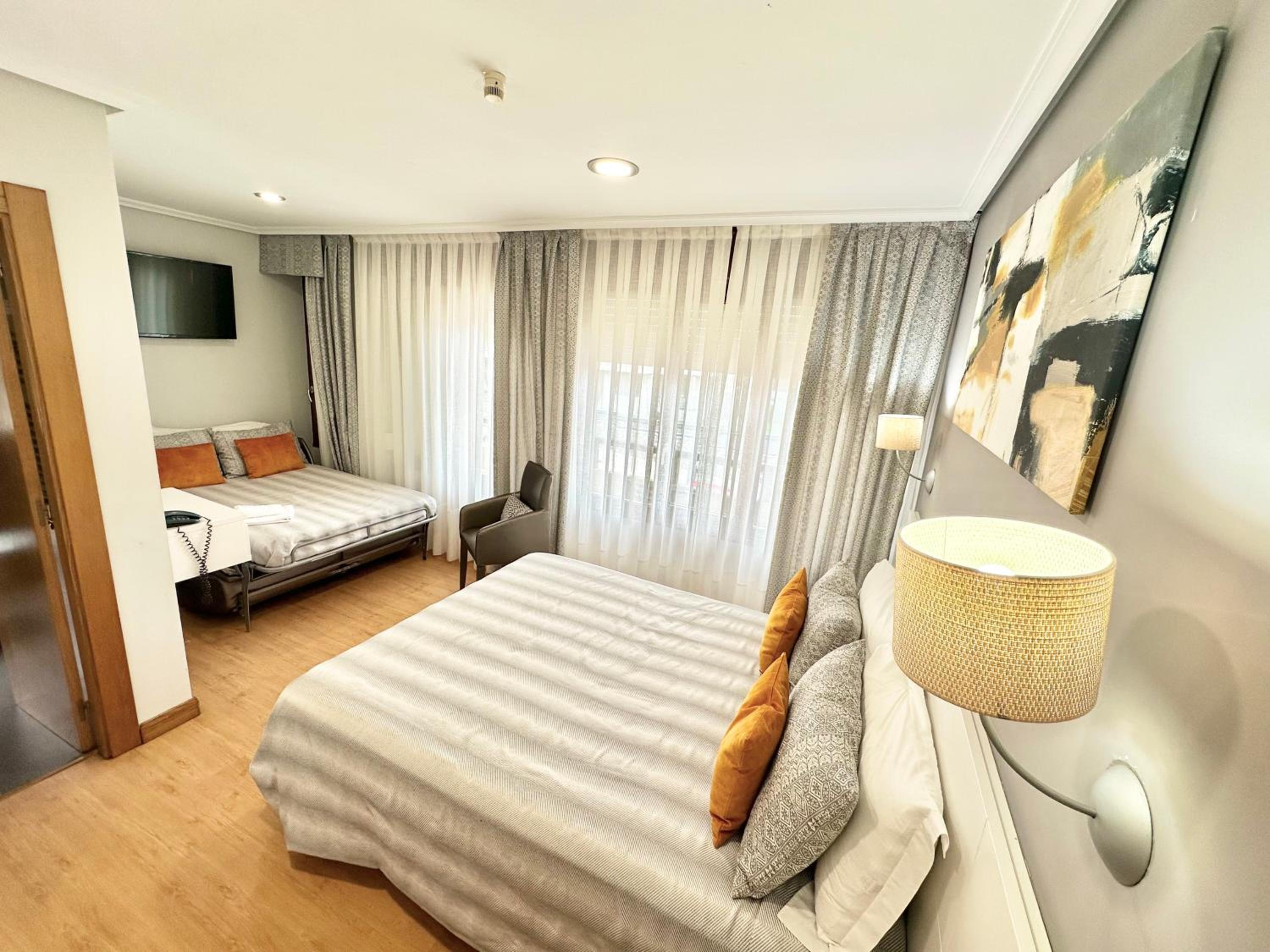 Habitación triple (2 adultos + 1 niño)