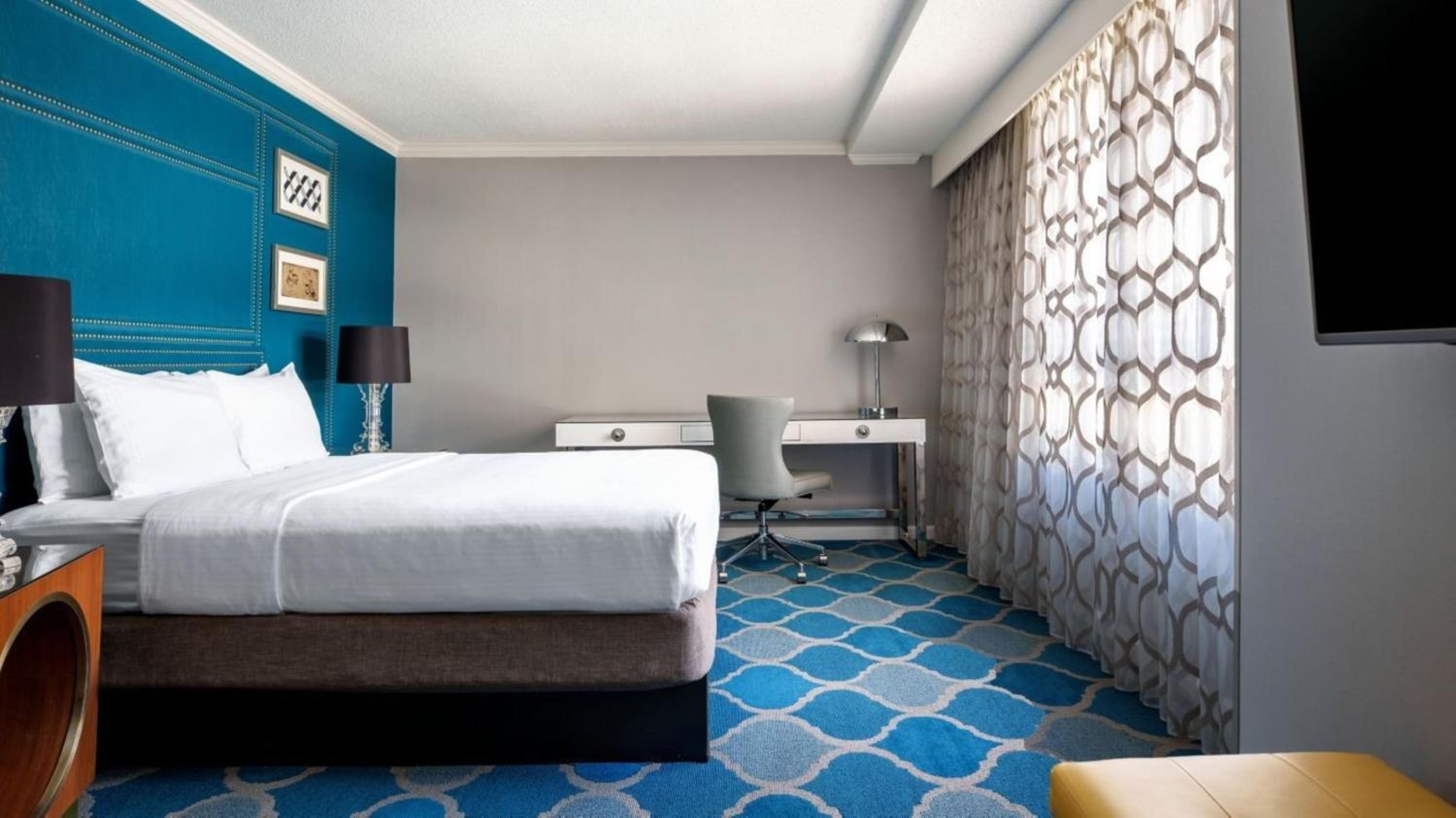 Deluxe Guest Room with 1 Queen - Photo 1