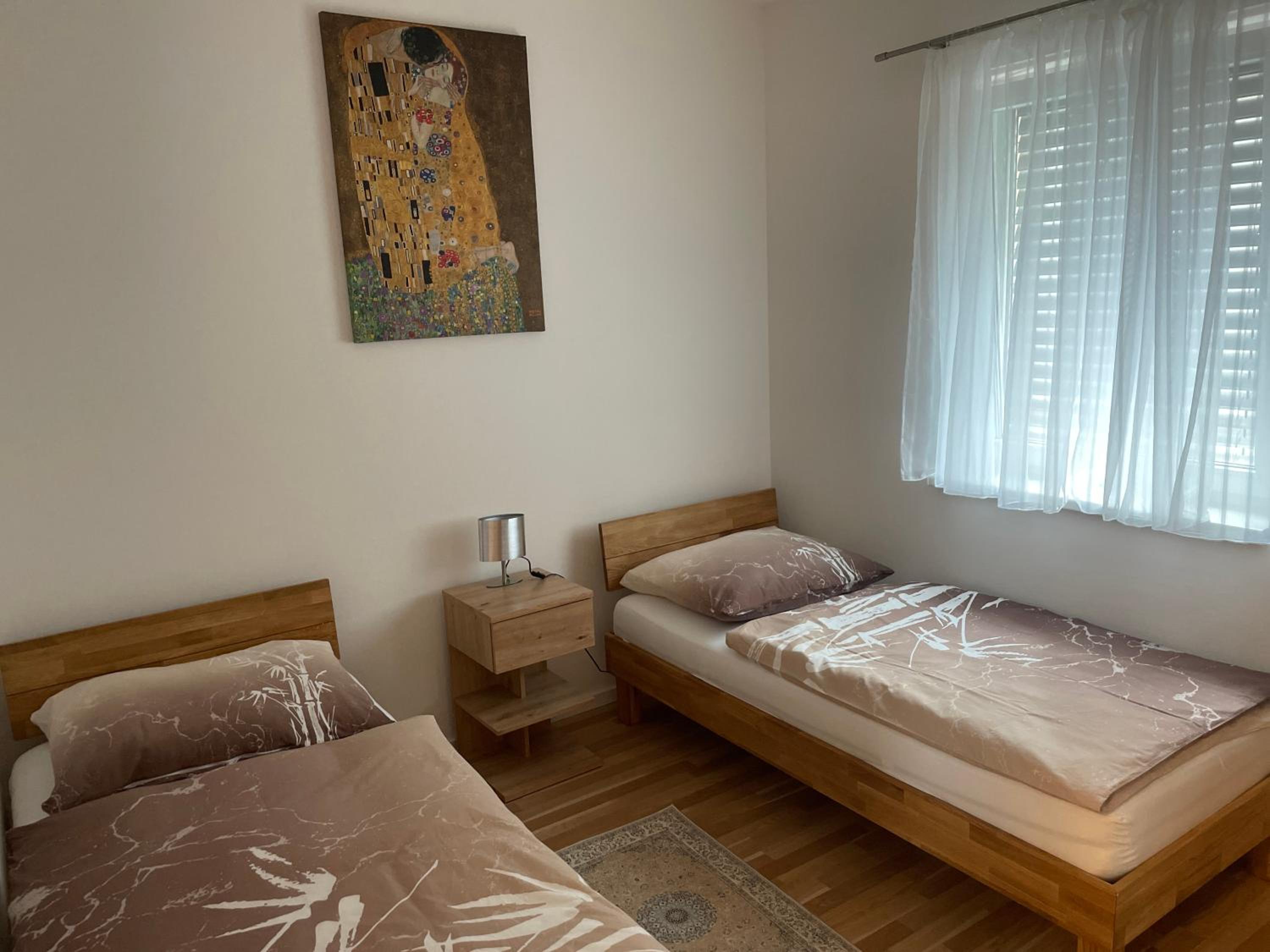 Three-Bedroom Apartment photo 1
