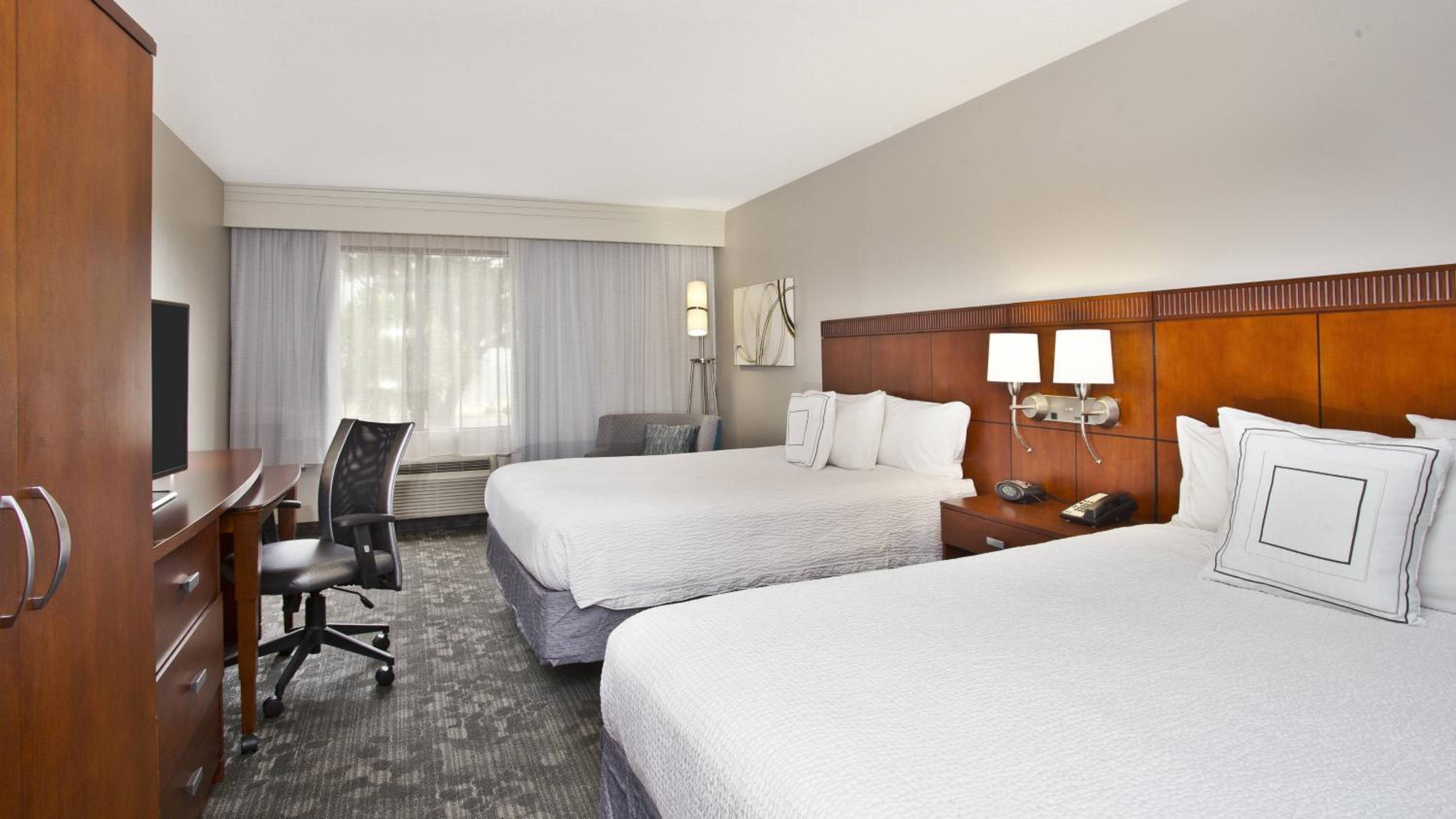 Queen Room with Two Queen Beds - Photo 1