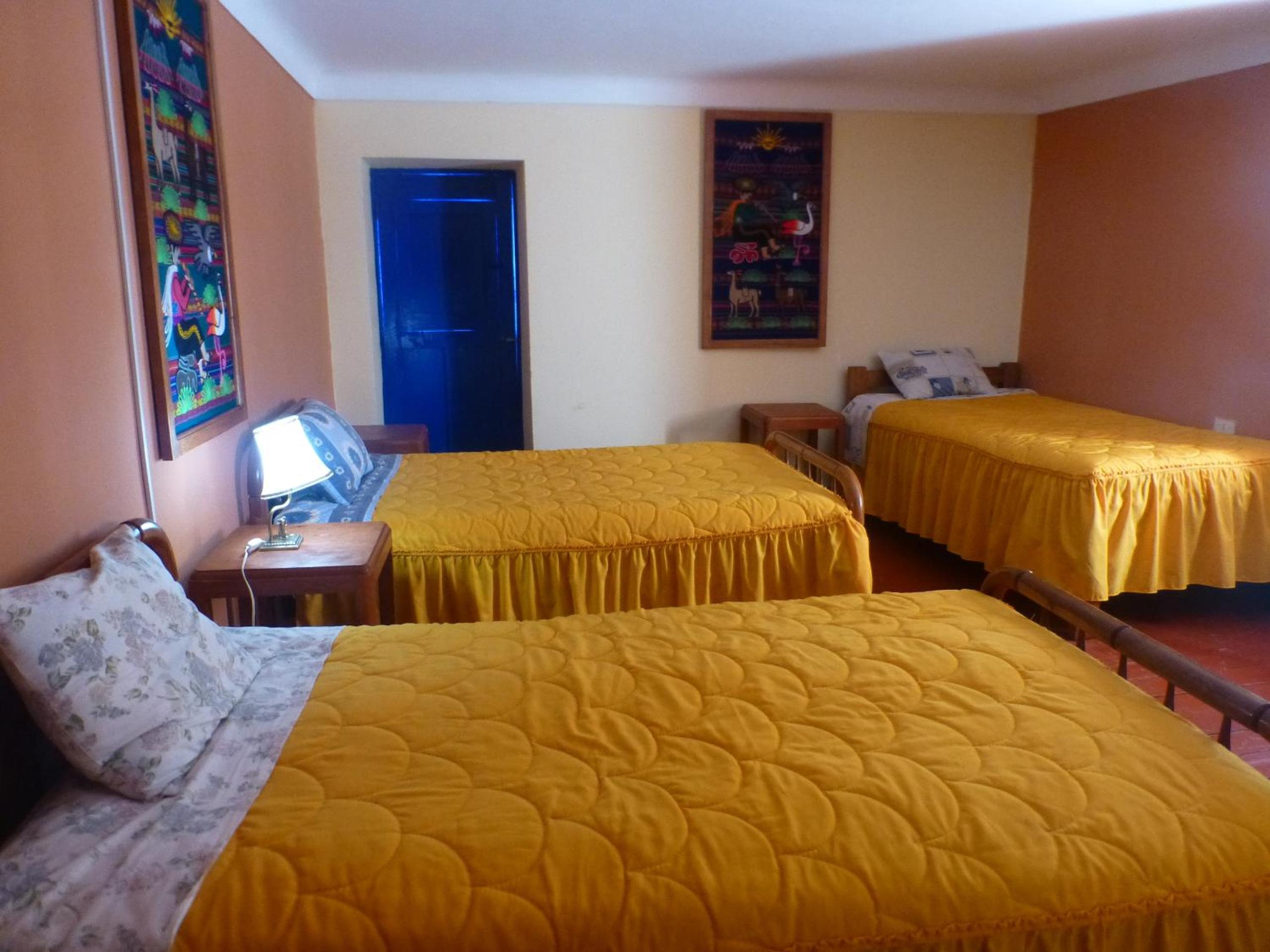 Basic Triple Room With Shared Bathroom photo 2