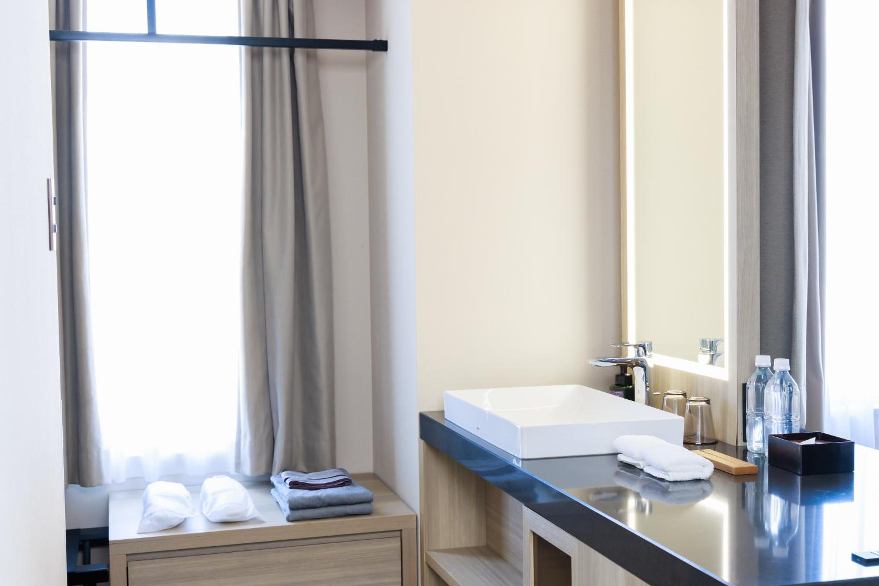 Deluxe Twin Room - Photo 12
