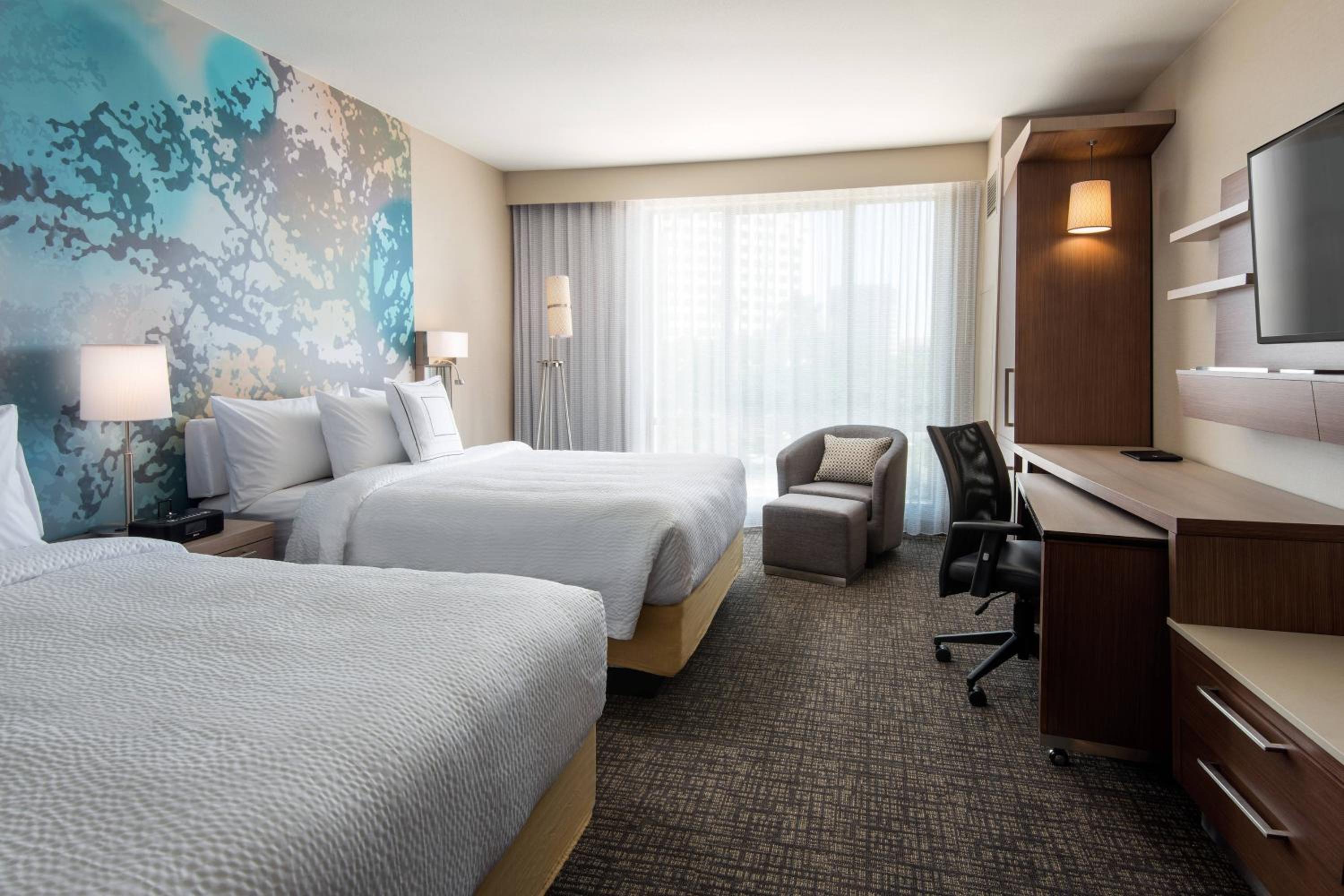 Queen Room with Two Queen Beds and Pool or City View - Hearing Accessible