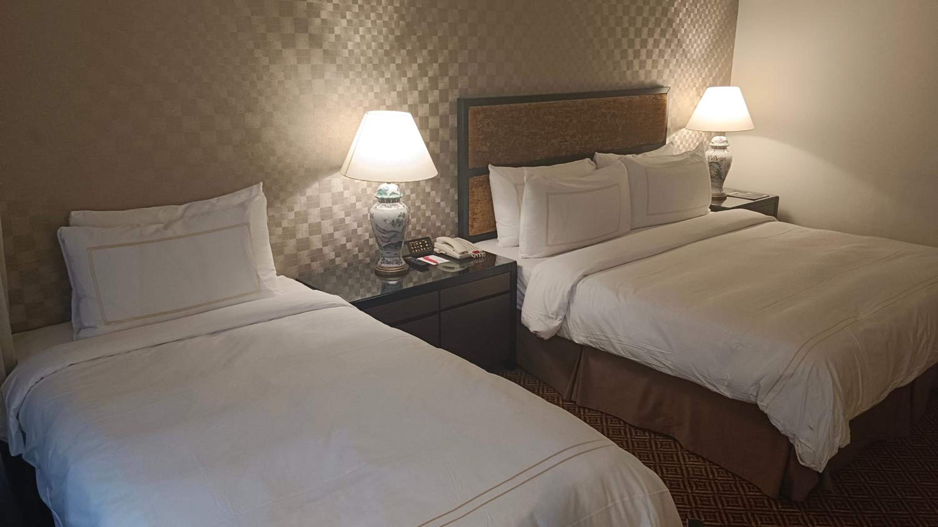 Deluxe Room with One King and Single Bed Deluxe Room with One King and Single Bed