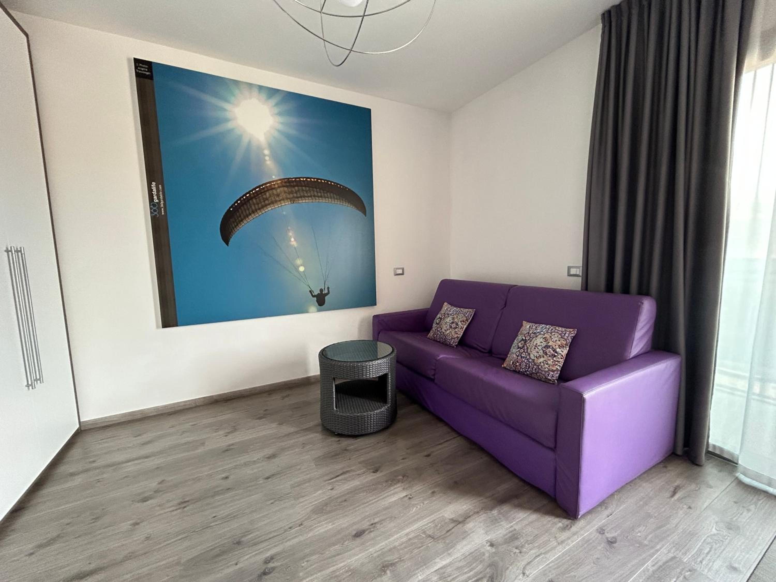 Deluxe One-Bedroom Apartment with Balcony and Lake View photo 1