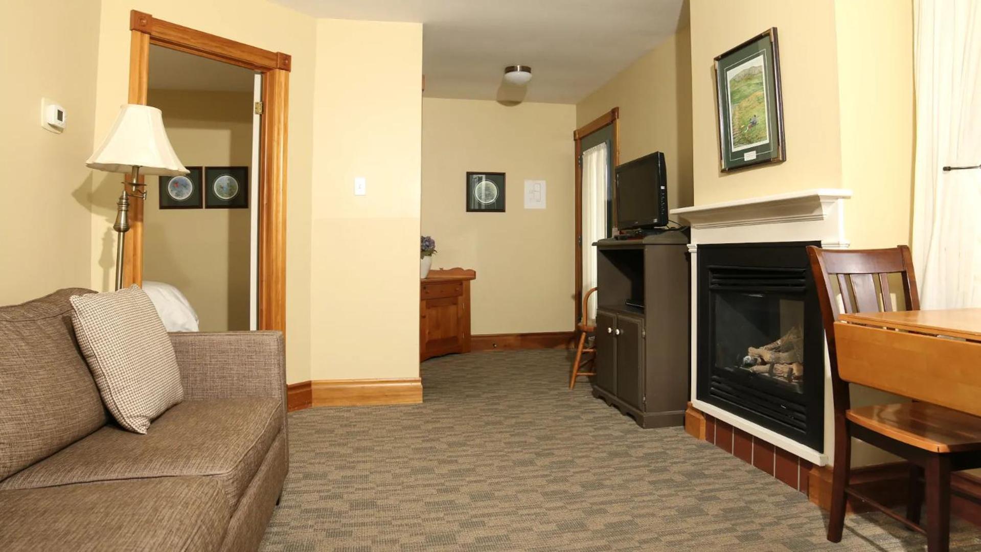 Queen Suite with Sofa Bed photo 2