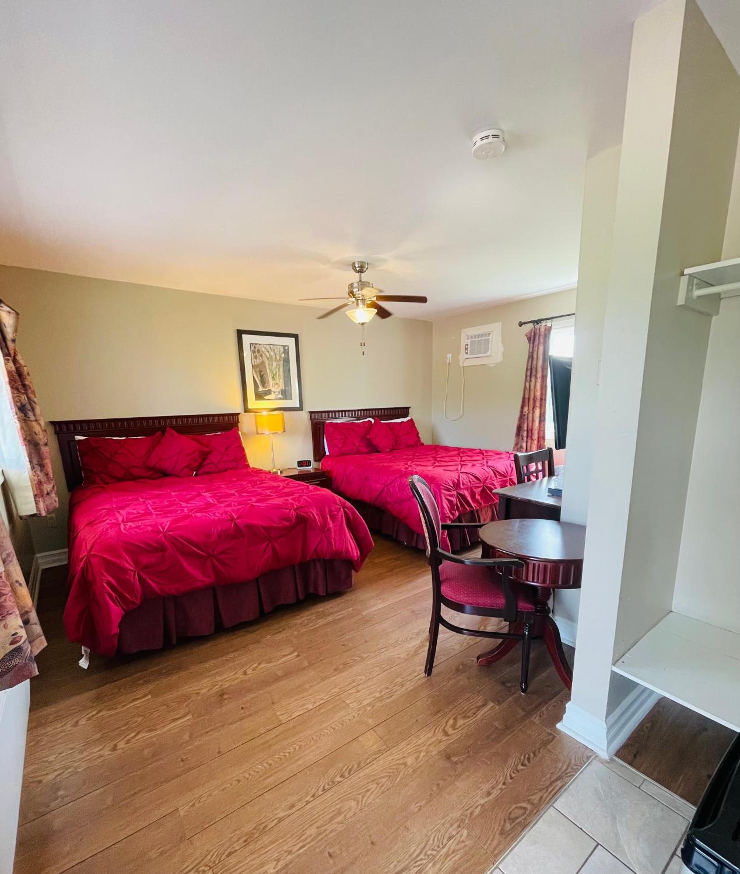 Queen Room with Two Queen Beds - Photo 1