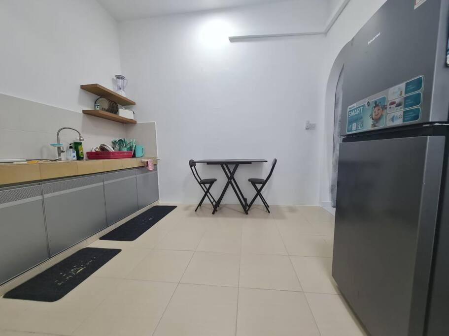 Three-Bedroom Apartment photo 2