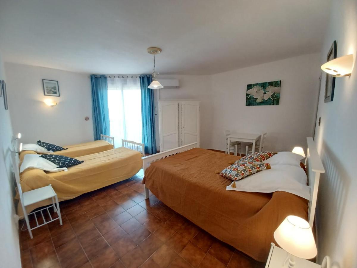 Quadruple Room (2 Adults + 2 Children) photo 3
