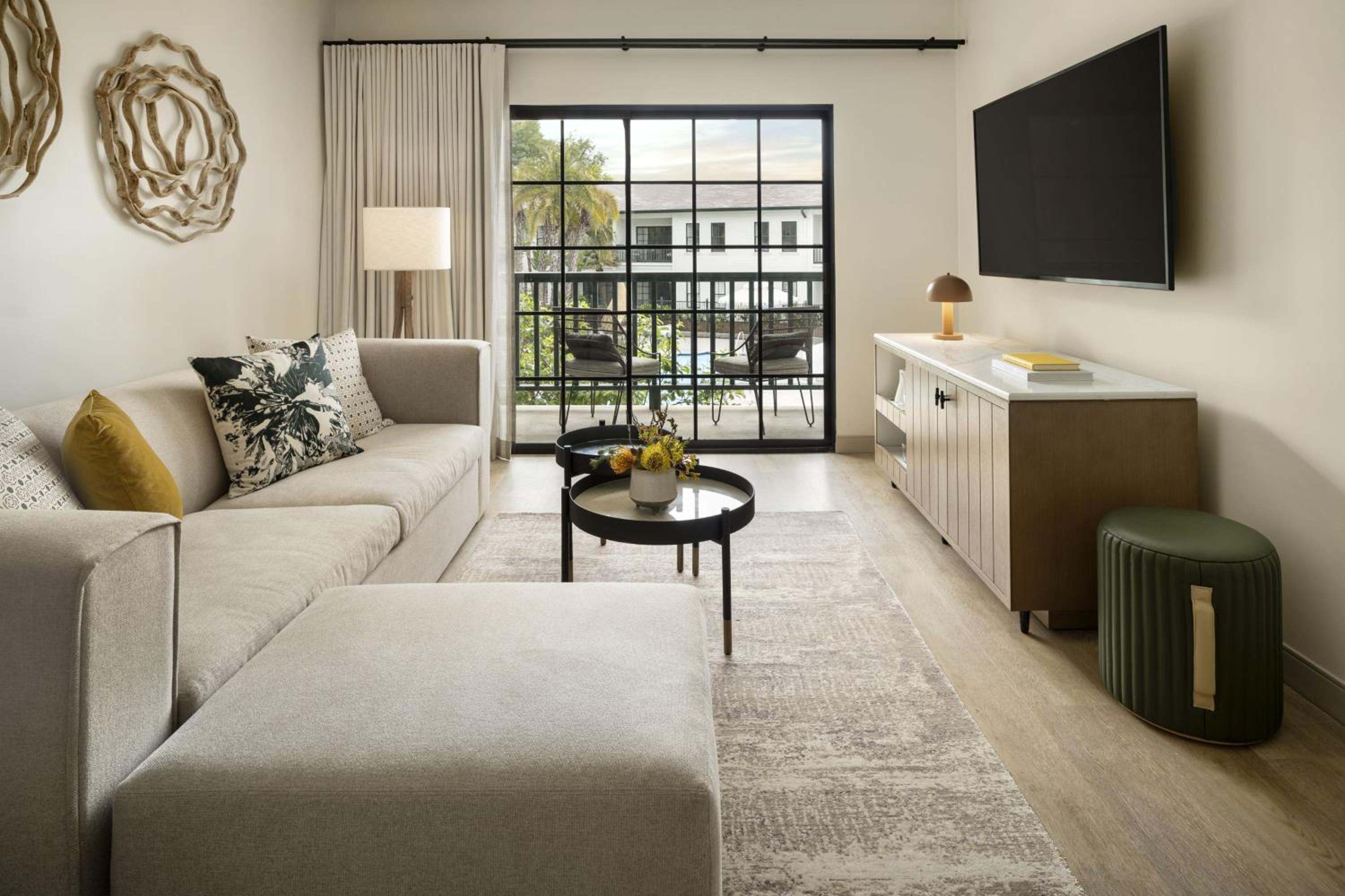 One-Bedroom King Suite with Pool View and Sofa Bed