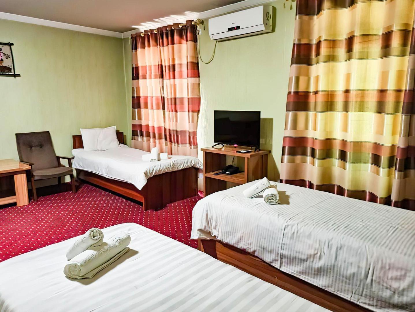 Triple Room - Photo 1