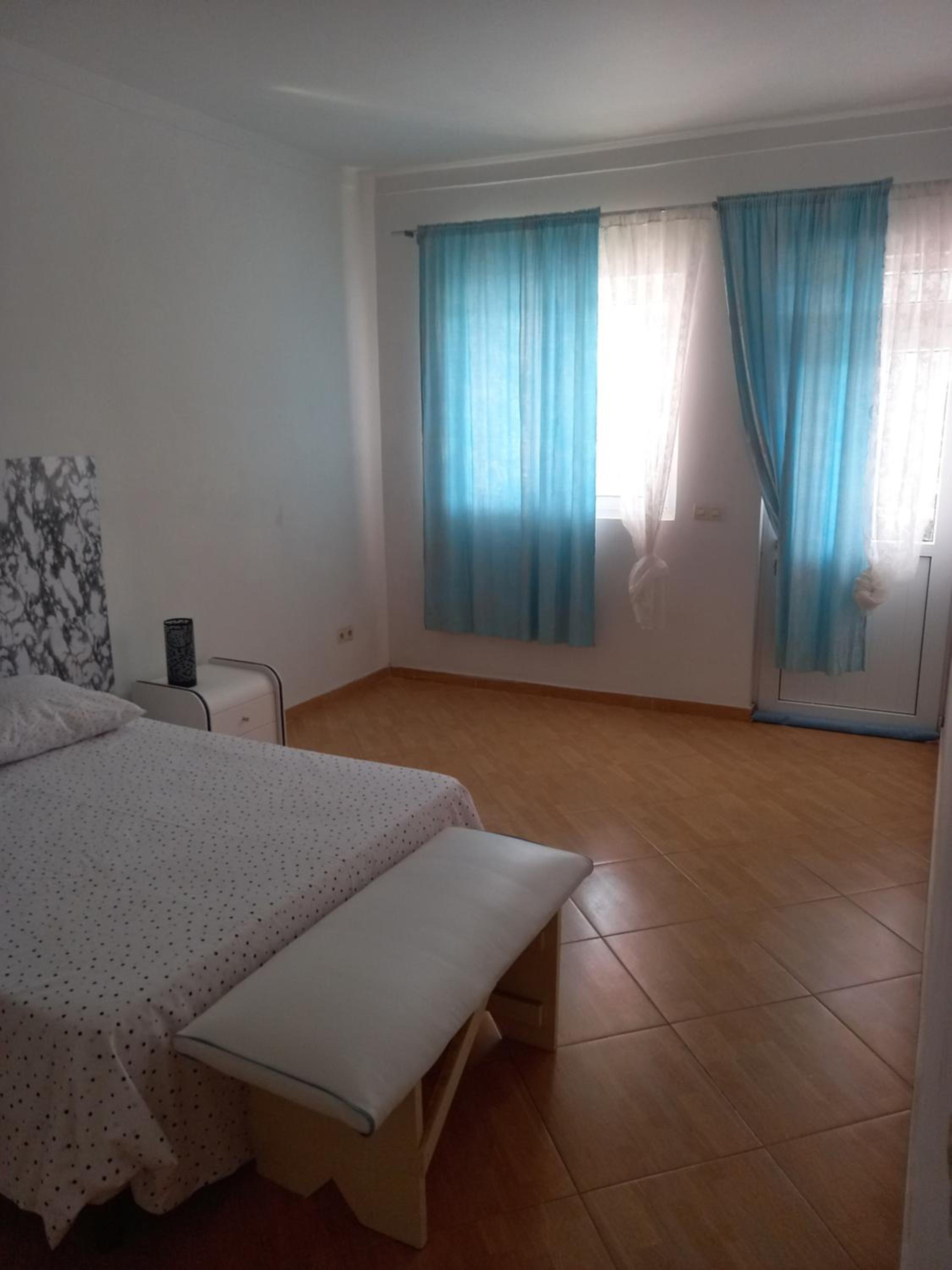Three-Bedroom Apartment photo 2