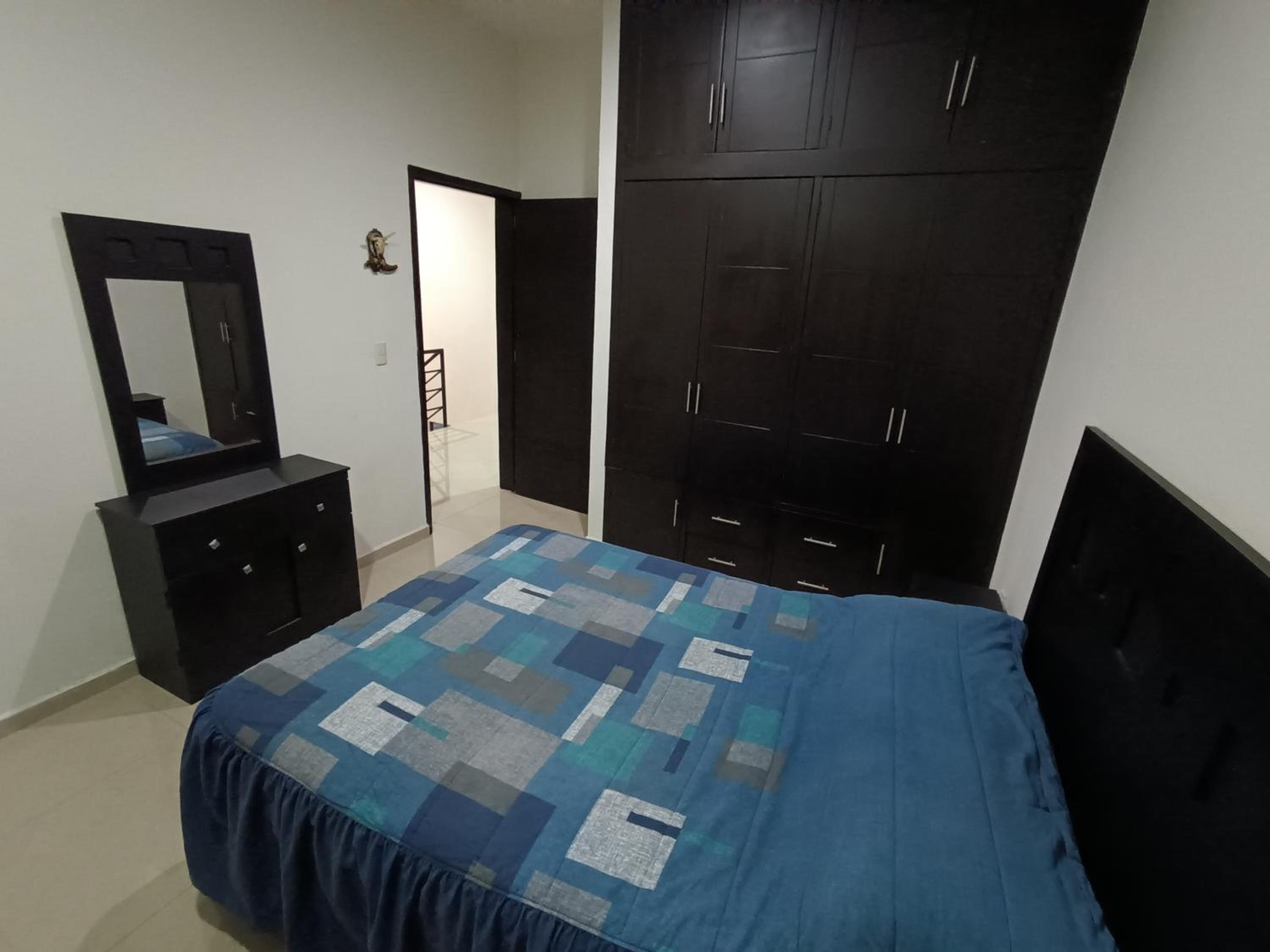 Three-Bedroom Apartment photo 1