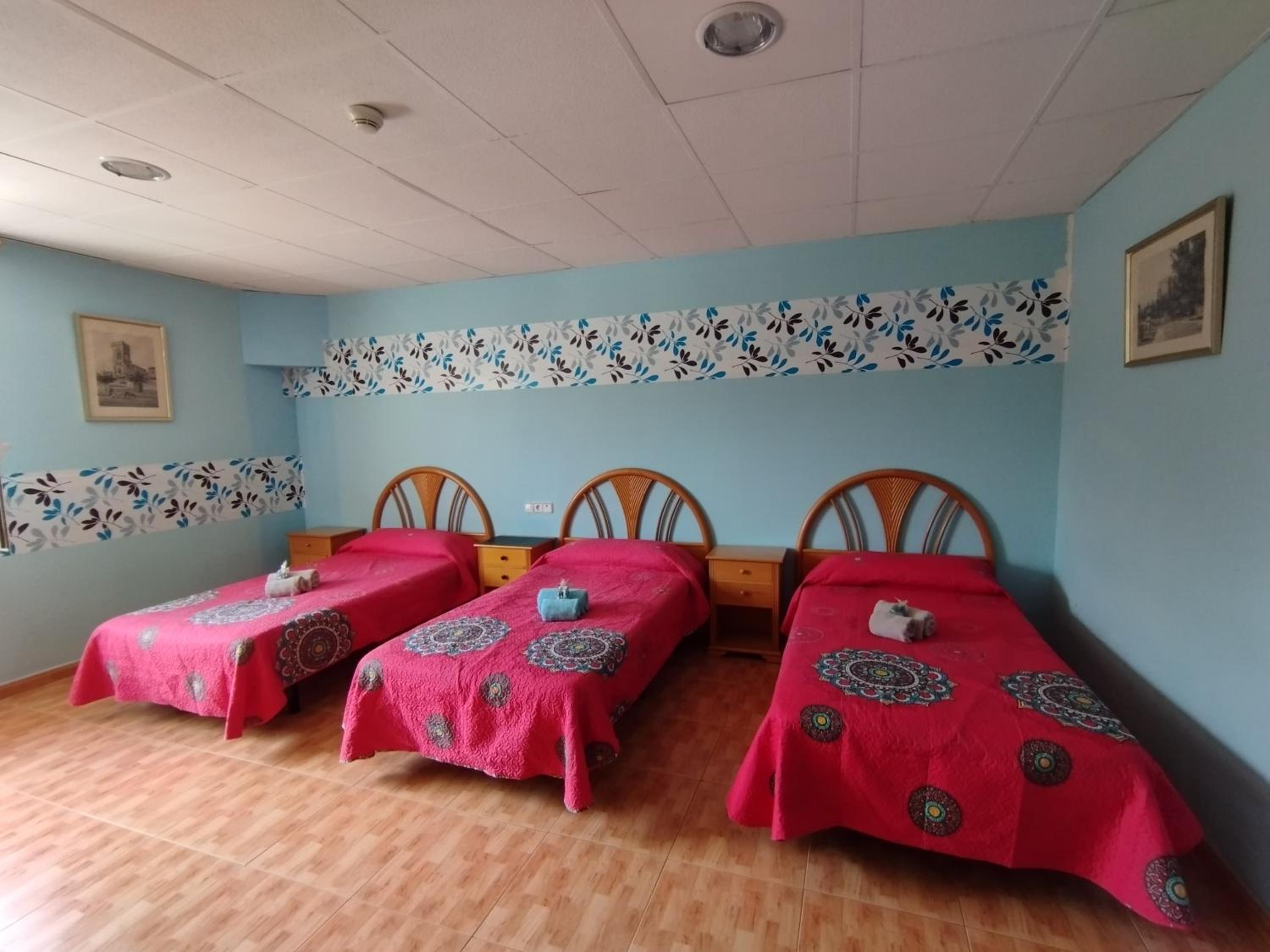 Habitación Triple con Baño Privado