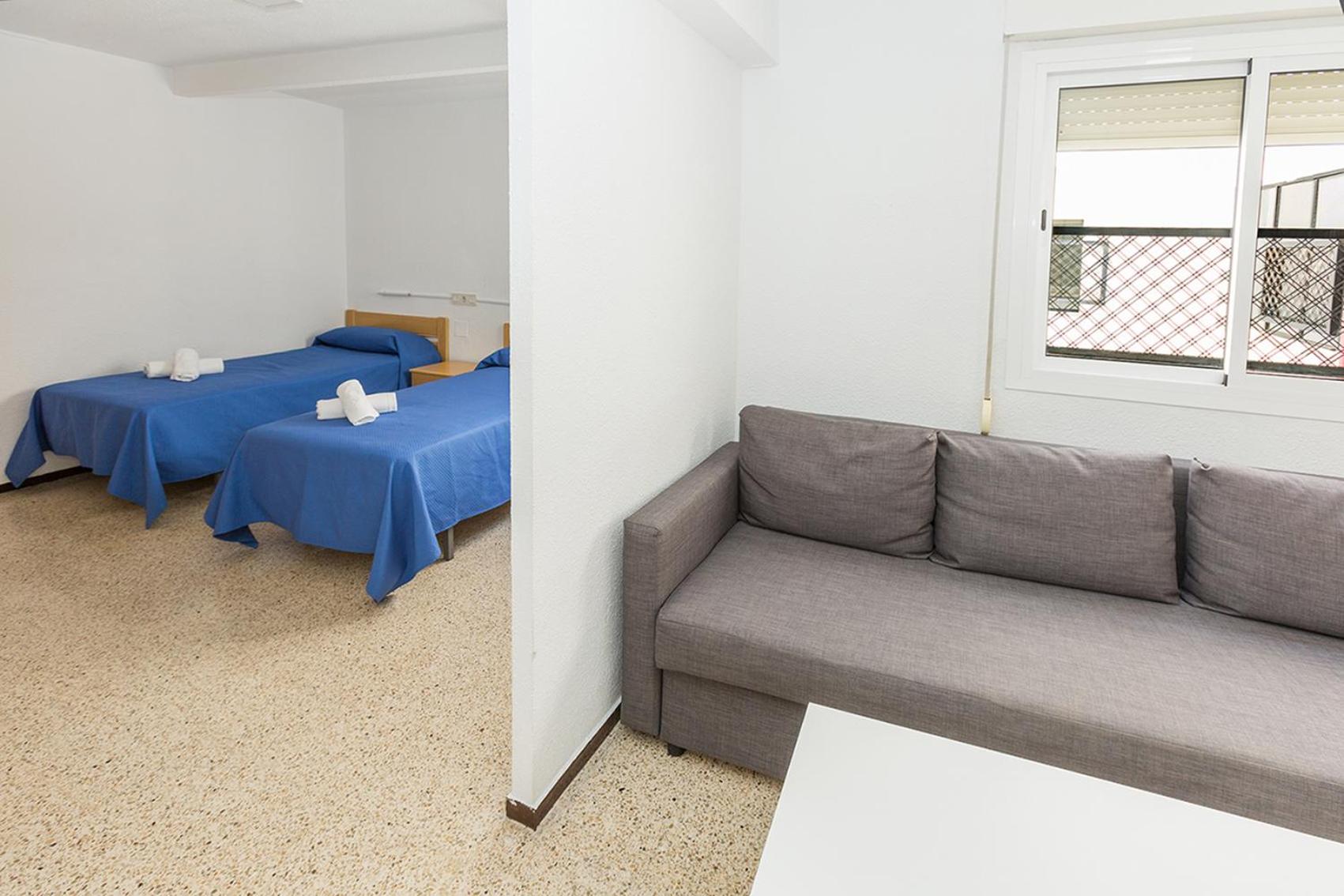 Habitación doble con sala de estar sin terraza.