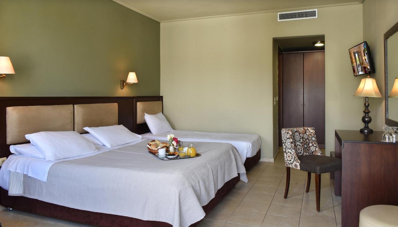 Triple Room - Photo 1