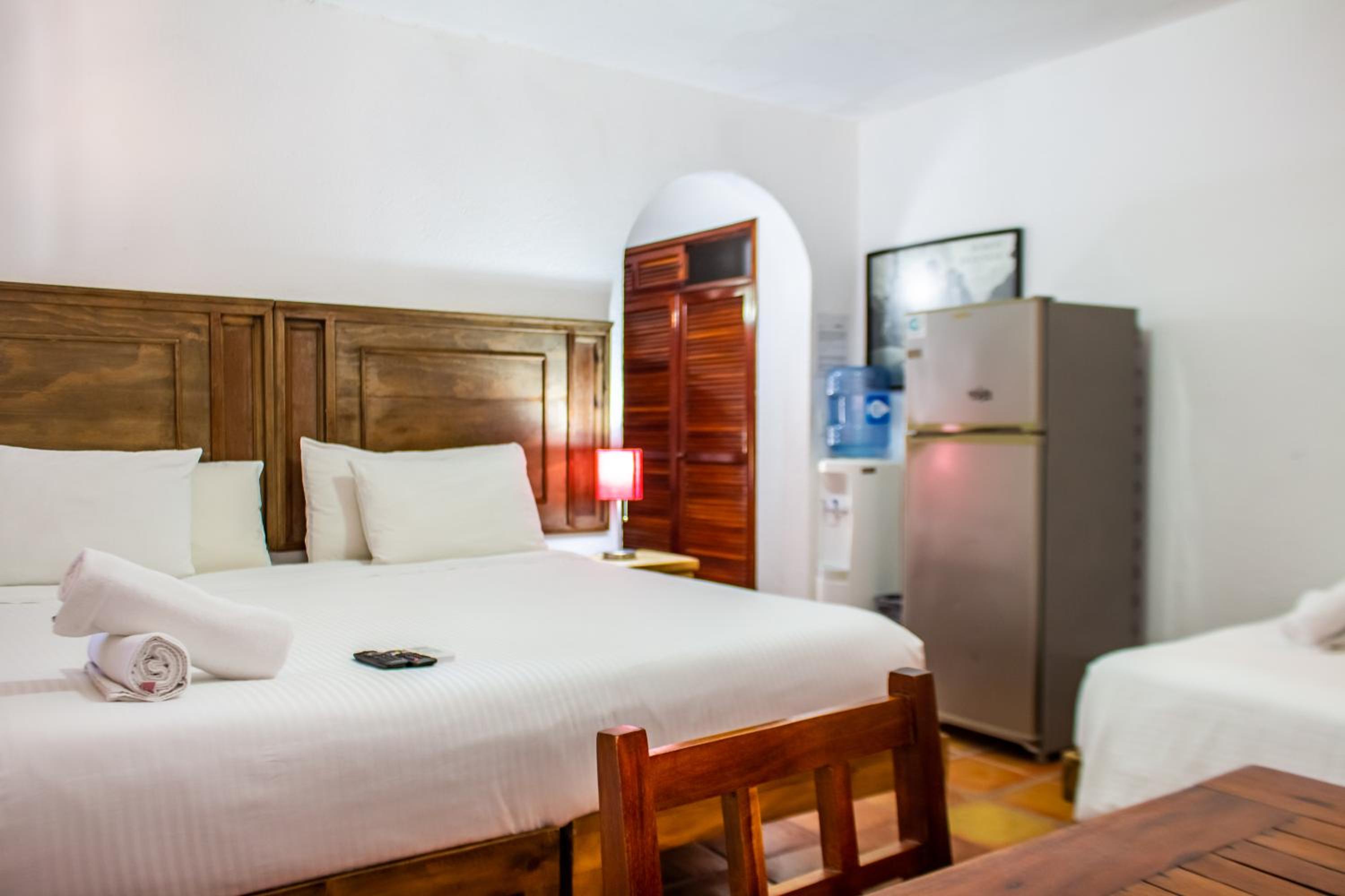 Economy Quadruple Room - Photo 6