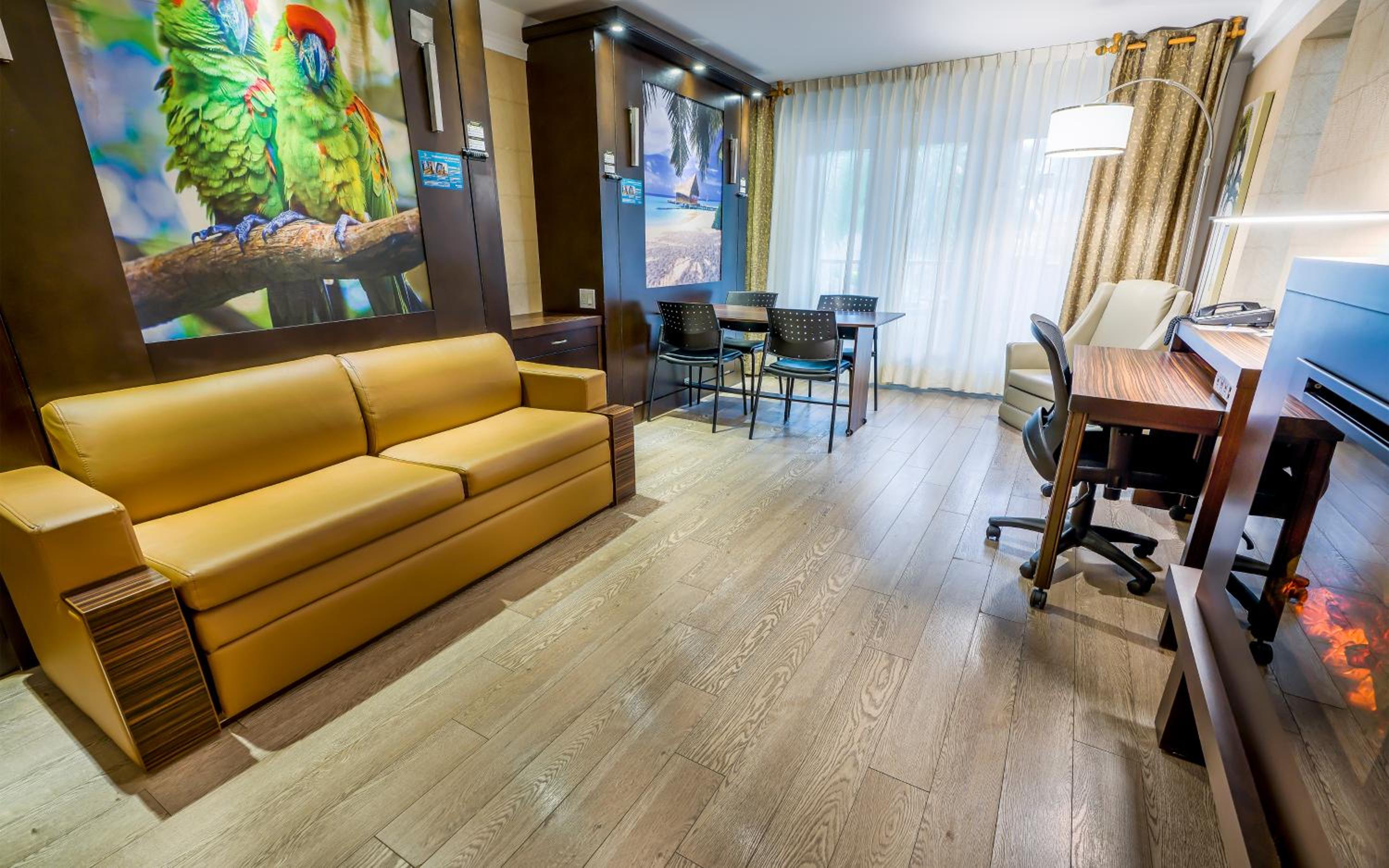 Queen Room with Two Queen Beds & Kitchenette - Pool View photo 1