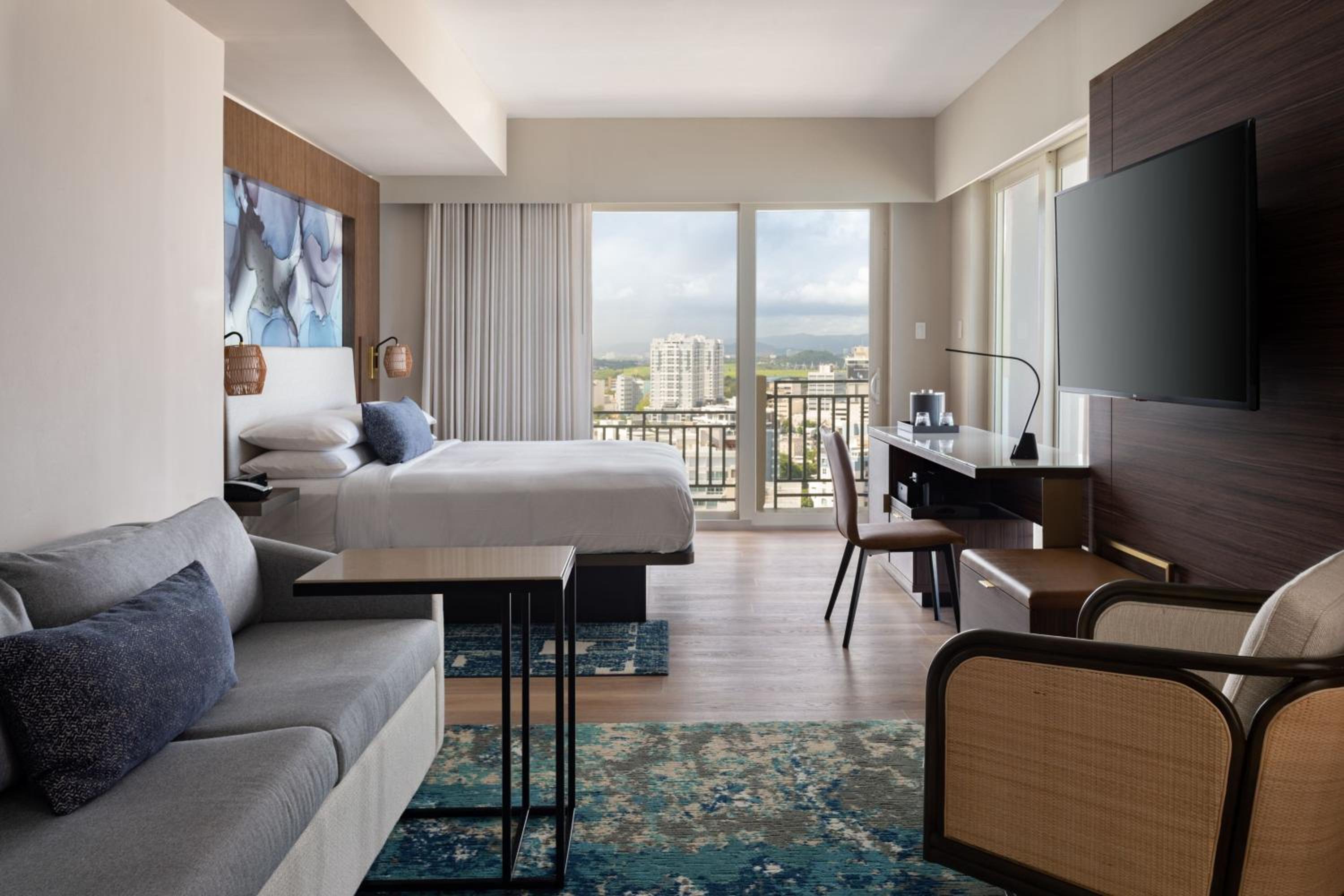 King Studio Suite with City and Pool View - Photo 1