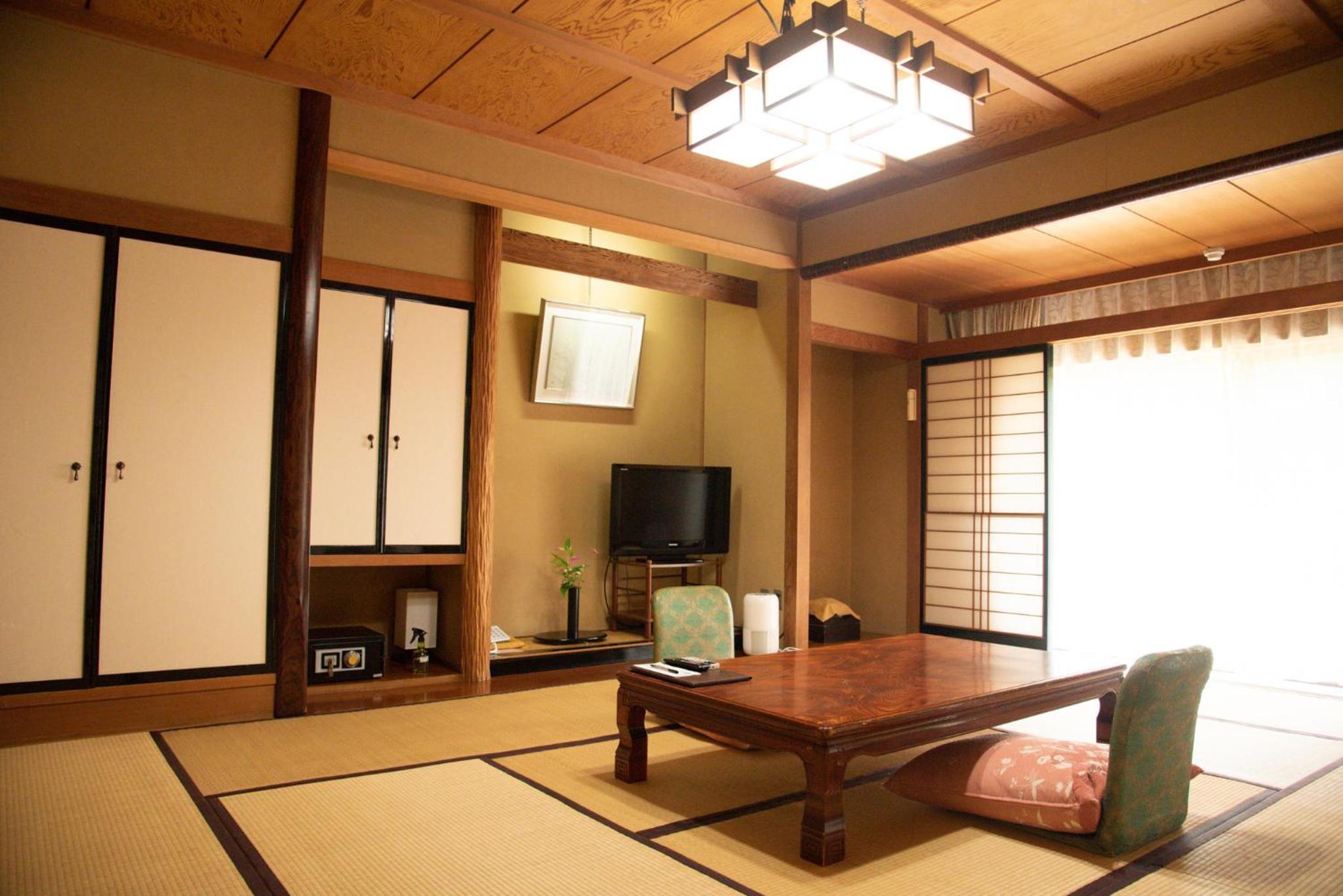 Quadruple Room with Shared Bathroom