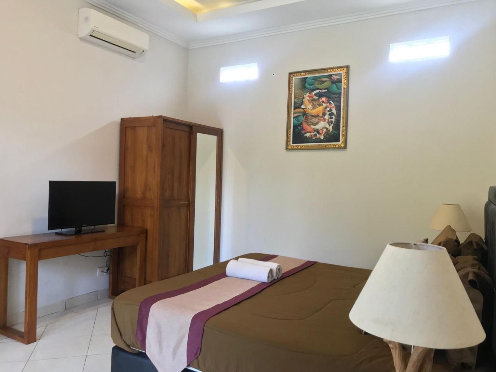 Deluxe Room - Photo 8