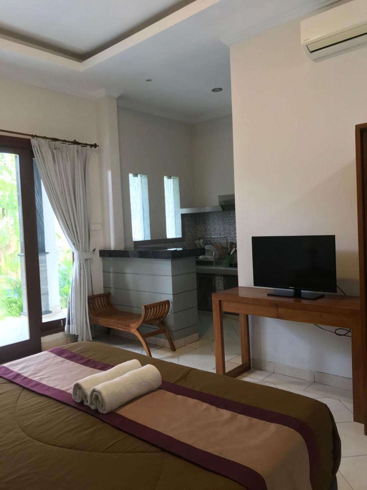 Deluxe Room - Photo 10