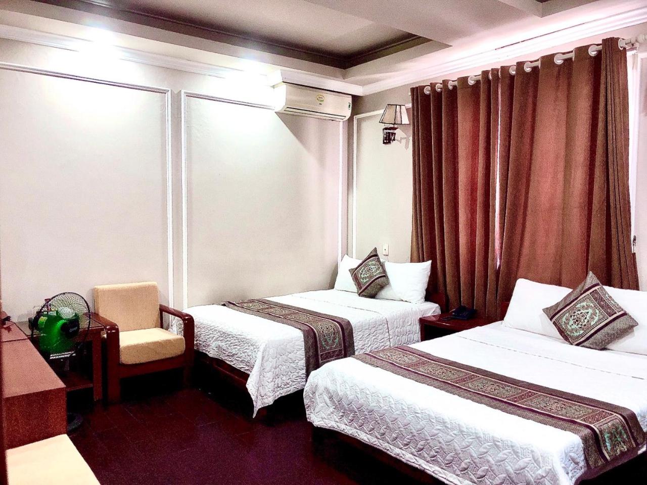Deluxe Queen Room with Two Queen Beds photo 1