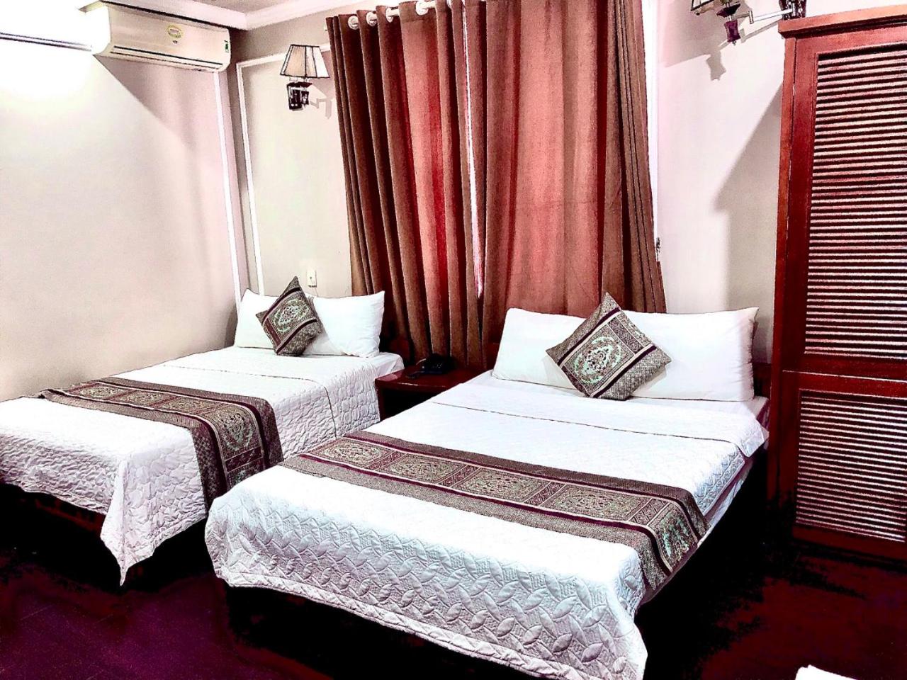 Deluxe Queen Room with Two Queen Beds photo 2