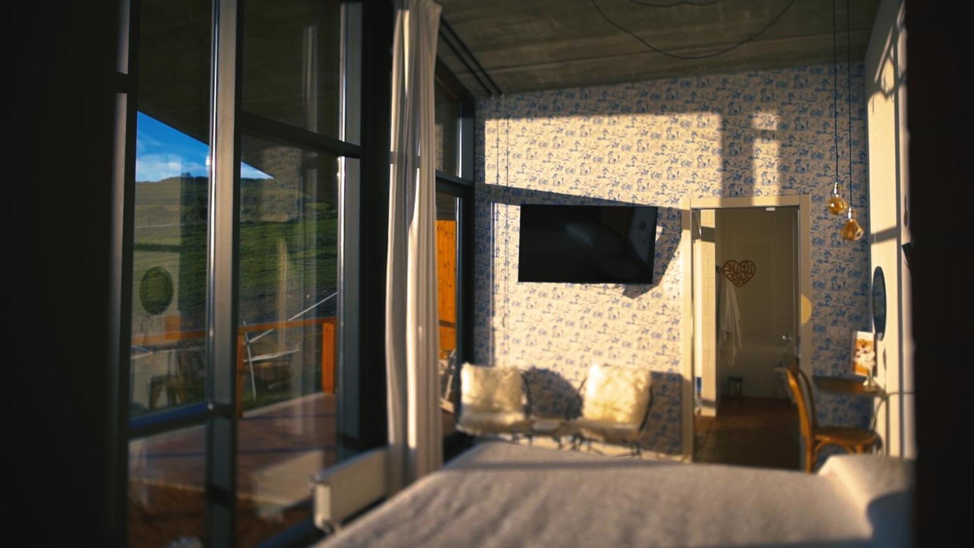 Habitación King con bañera de hidromasaje.