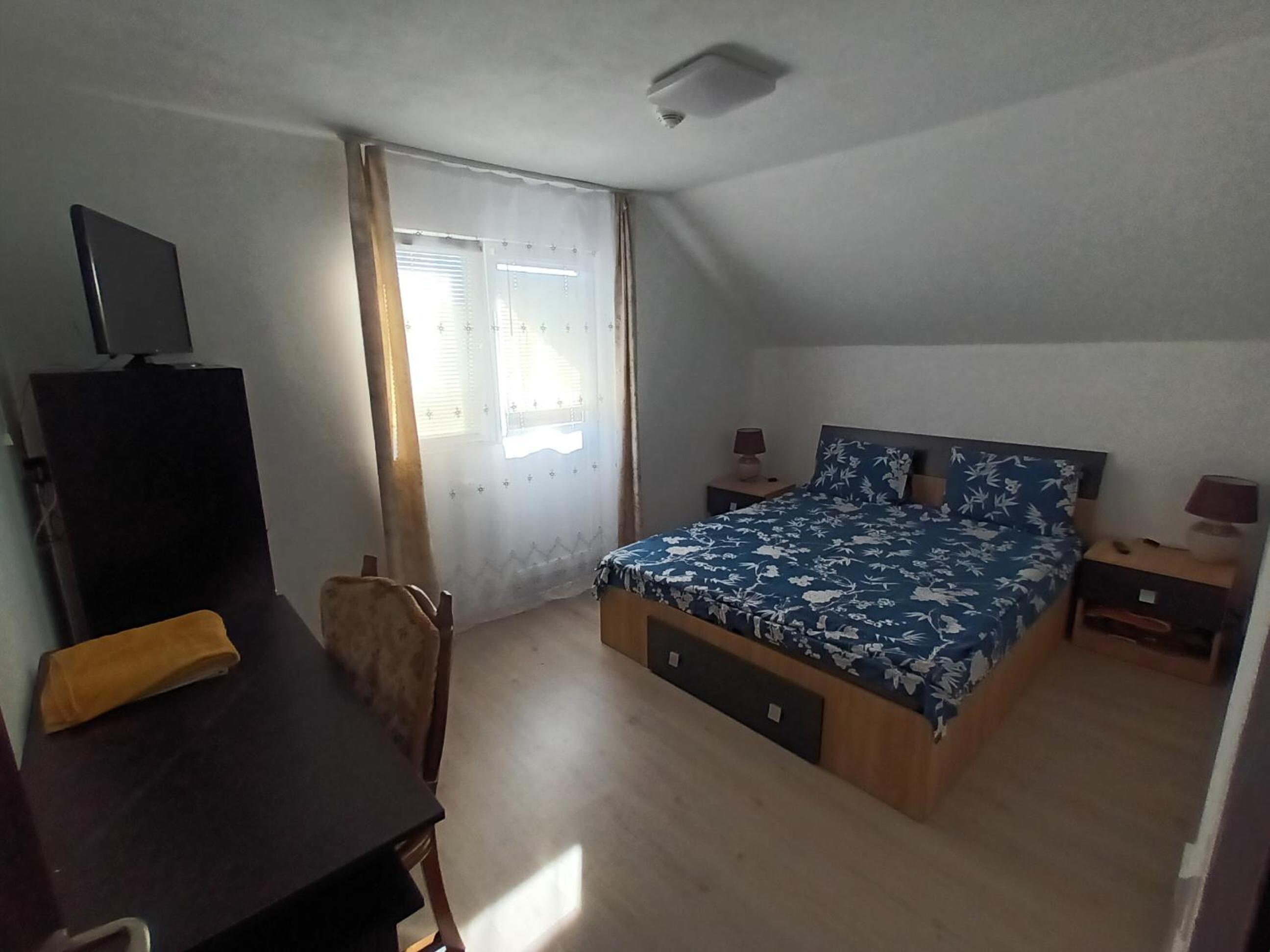 Three-Bedroom Apartment - Photo 2